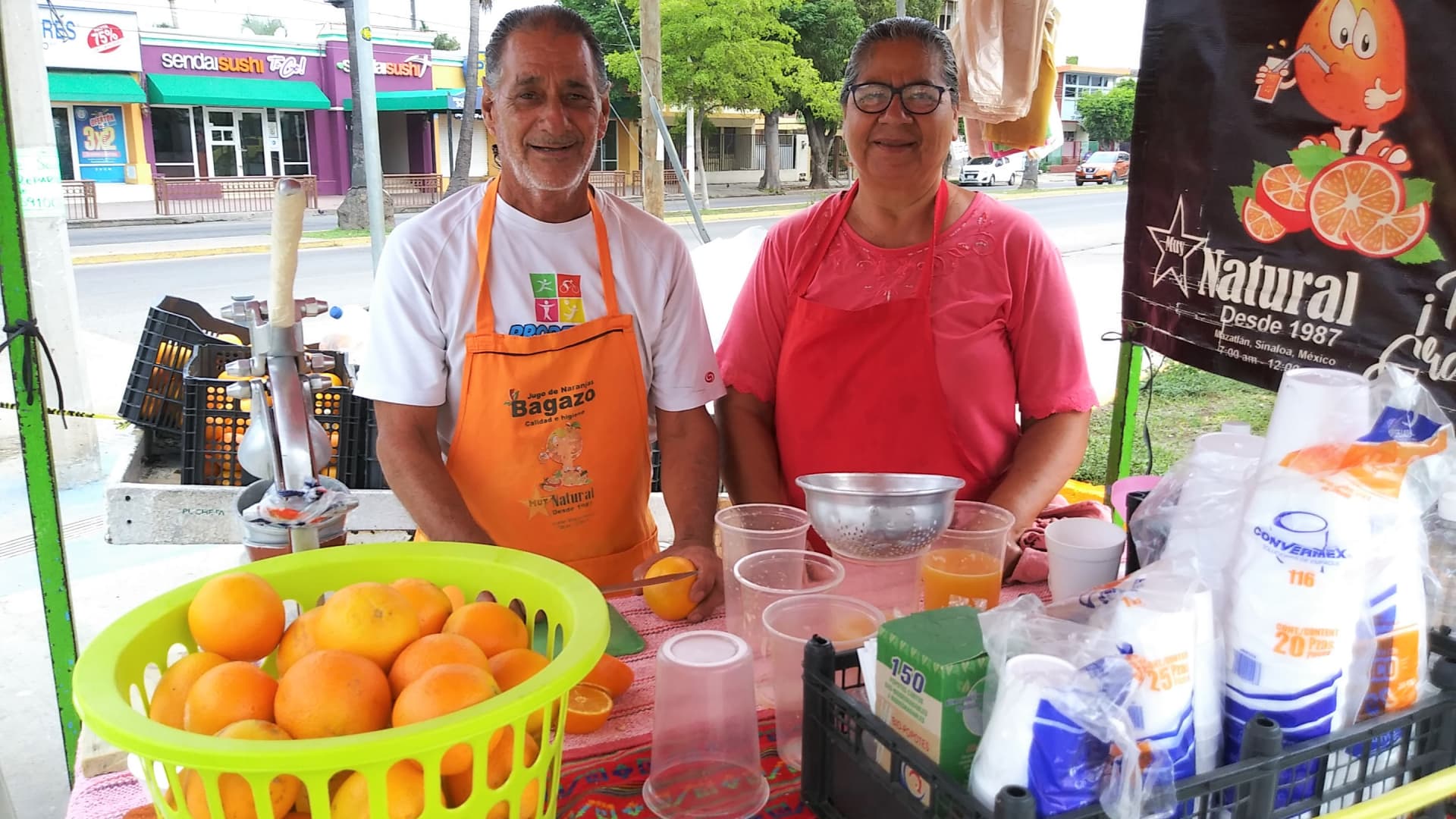 For 45 years, Maria Guadalupe and Antonio have been squeezing and selling fresh orange juice from their stand on this corner.