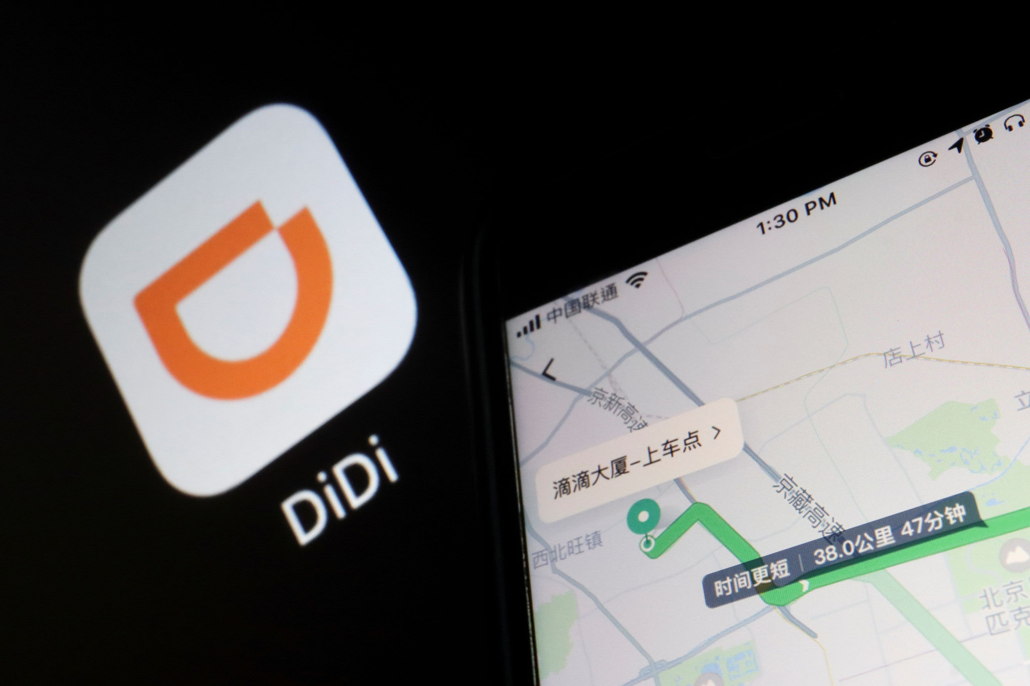Softbank fall steepens after report that Chinese regulators have asked Didi to d..