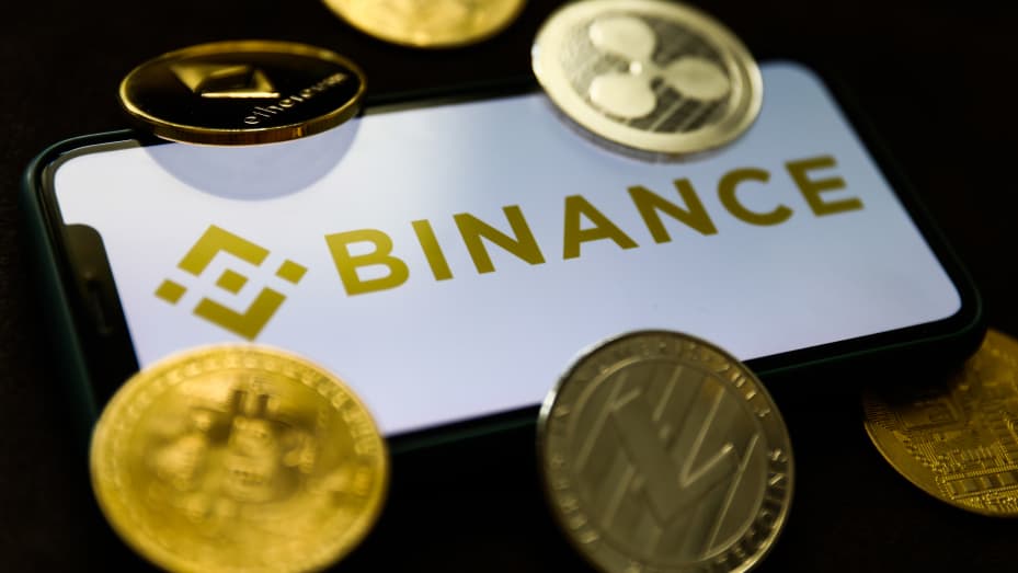 The logo of cryptocurrency exchange Binance displayed on a phone screen.