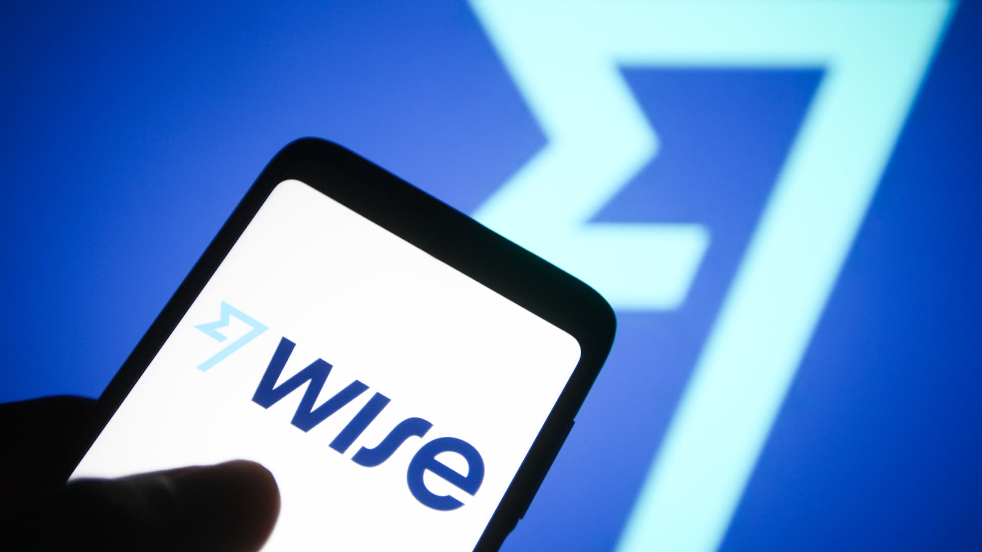 The Wise logo displayed on a smartphone screen.