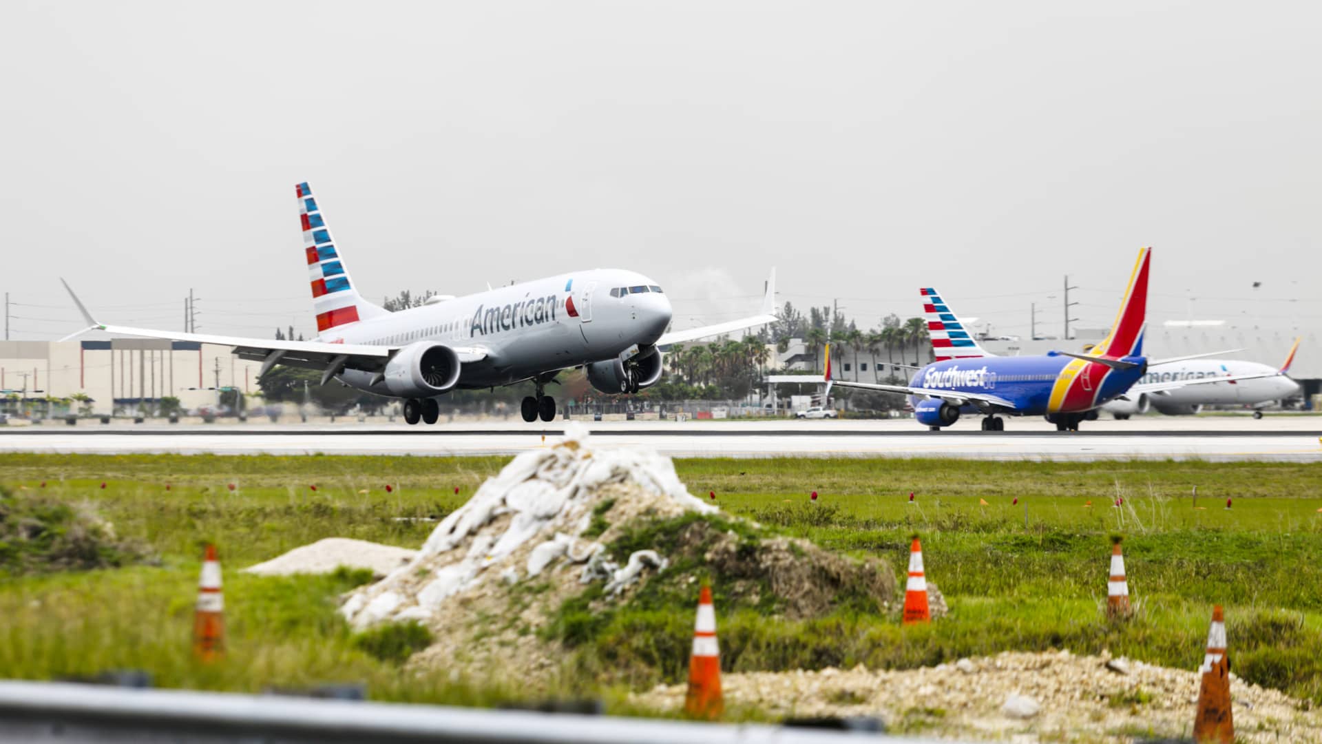 A passenger aircraft operated by American Airlines Group Inc. lands at Miami International Airport in Miami, Florida, U.S., on Wednesday, June 16, 2021.