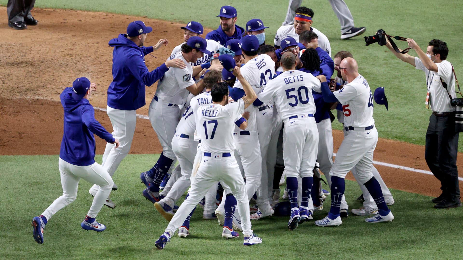 The Los Angeles Dodgers celebrate after defeating the Tampa Bay Rays 3-1 in Game Six to win the 2020 MLB World Series at Globe Life Field on October 27, 2020 in Arlington, Texas.