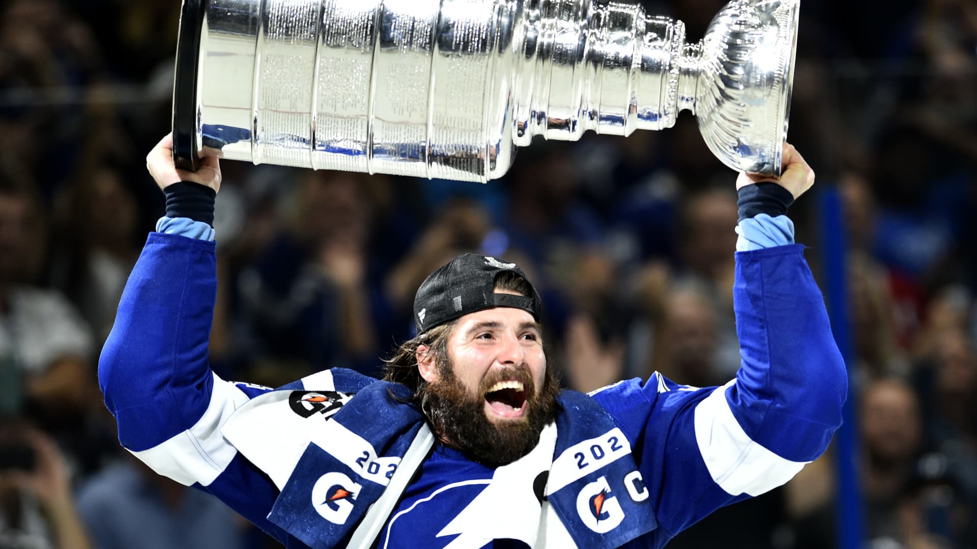 Pat Maroon #14 of the Tampa Bay Lightning hoists the Stanley Cup after their 1-0 win in Game Five of the 2021 Stanley Cup Final to win the series four games to one against the Montreal Canadiens at Amalie Arena on July 07, 2021 in Tampa, Florida.