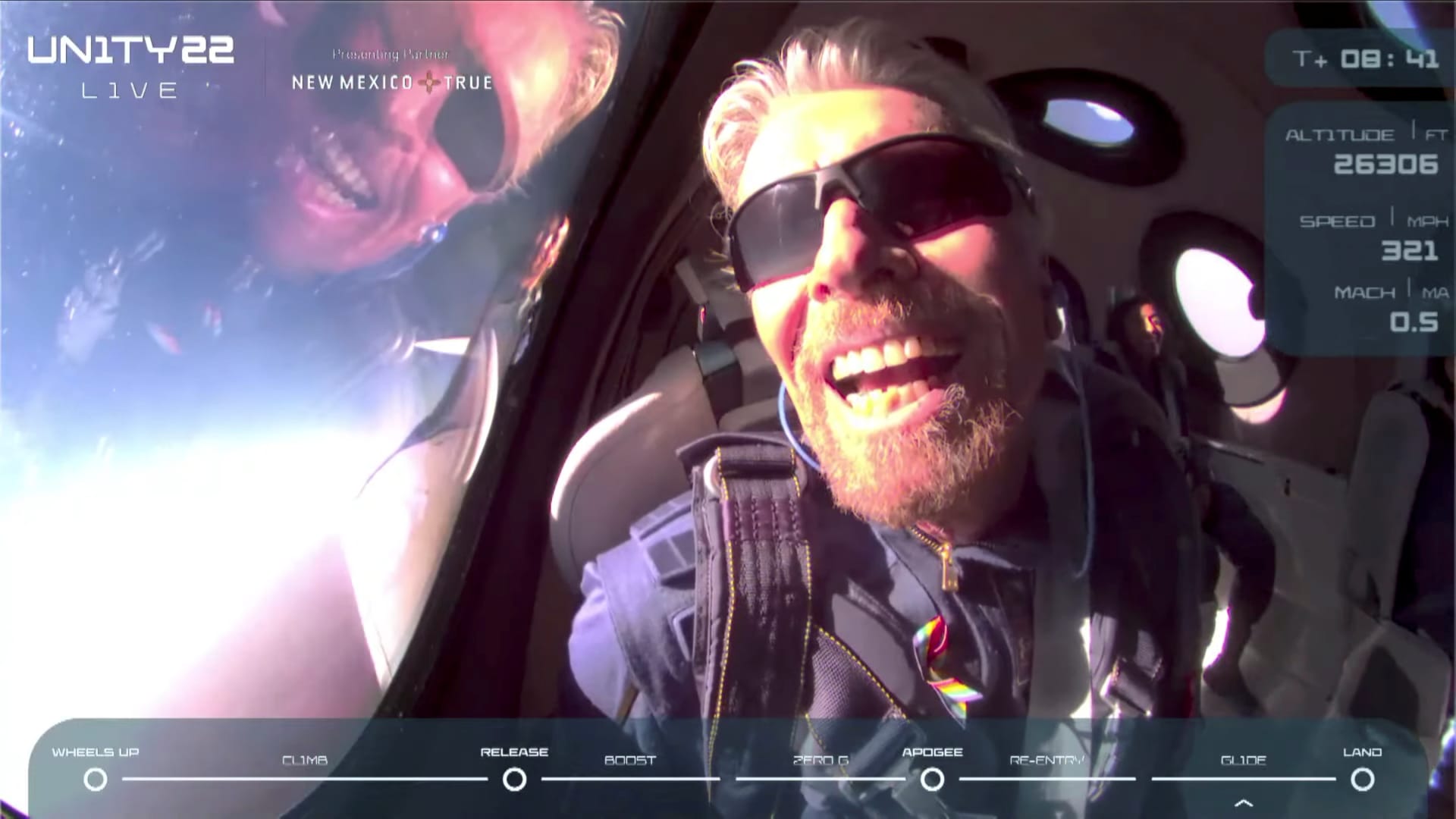 Billionaire Richard Branson reacts on board Virgin Galactic's passenger rocket plane VSS Unity after reaching the edge of space above Spaceport America near Truth or Consequences, New Mexico, U.S. July 11, 2021 in a still image from video.