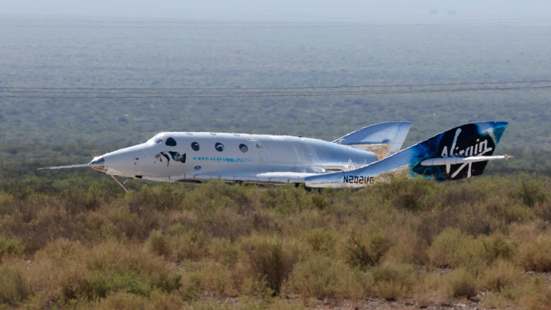 Virgin Galactic's passenger rocket plane VSS Unity, carrying billionaire entrepreneur Richard Branson and his crew, lands after reaching the edge of space above Spaceport America near Truth or Consequences, New Mexico, U.S., July 11, 2021.