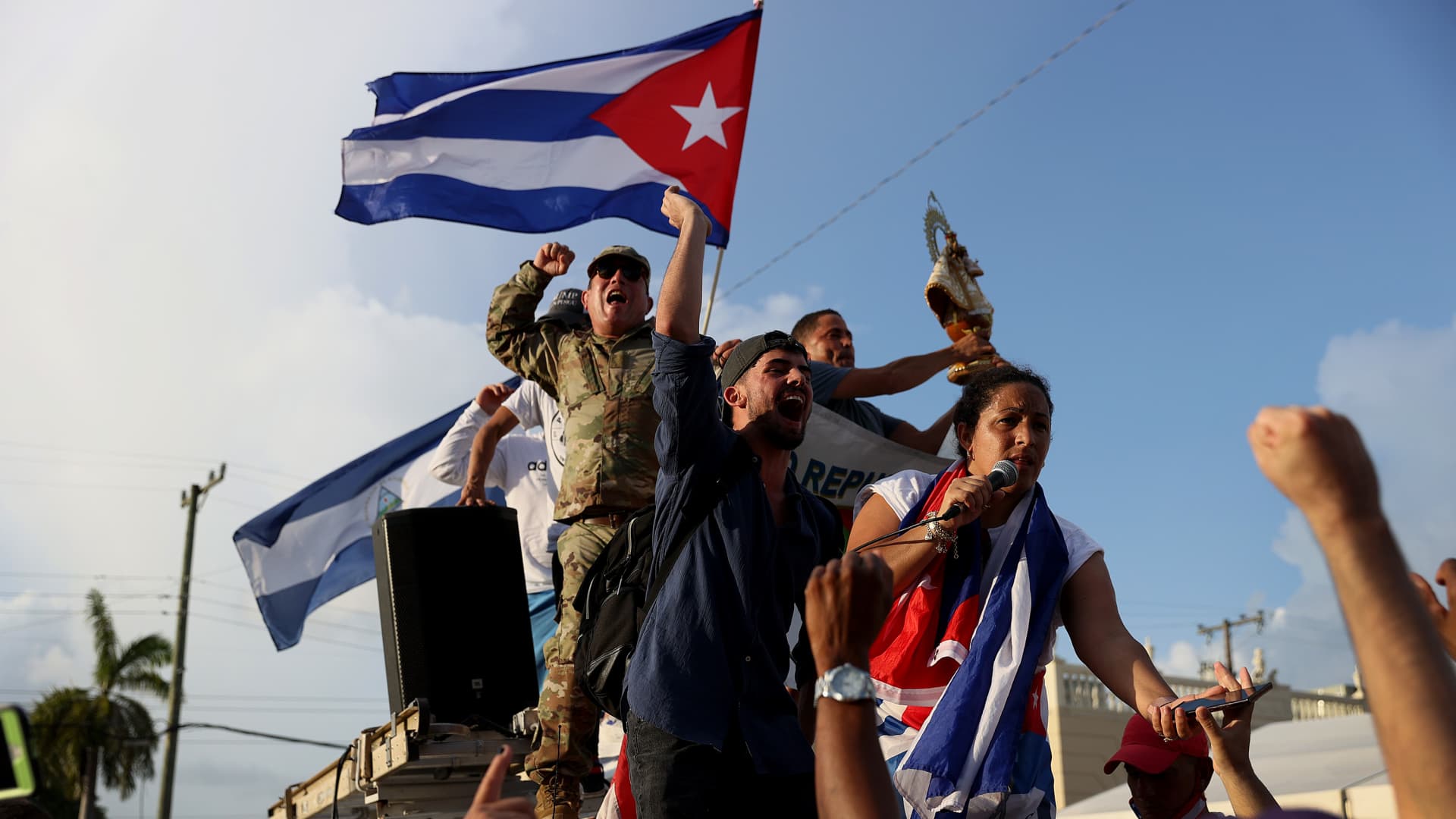 Protesters gather in front of the Versailles restaurant to show support for the people in Cuba who have taken to the streets there to protest on July 11, 2021 in Miami, Florida.