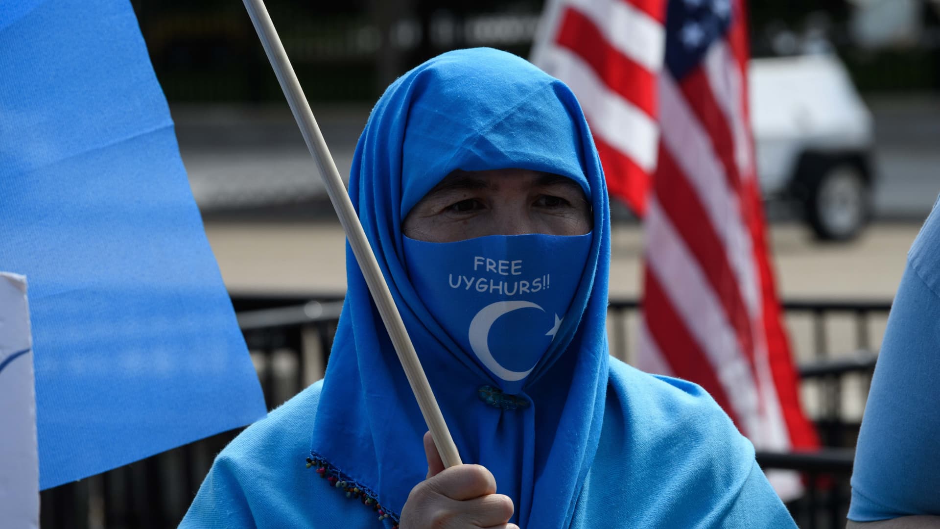 Uyghurs of the East Turkistan National Awakening Movement (ETNAM) hold a rally to protest the 71st anniversary of the People's Republic of China in front of the White House in Washington, DC, on October 1, 2020.