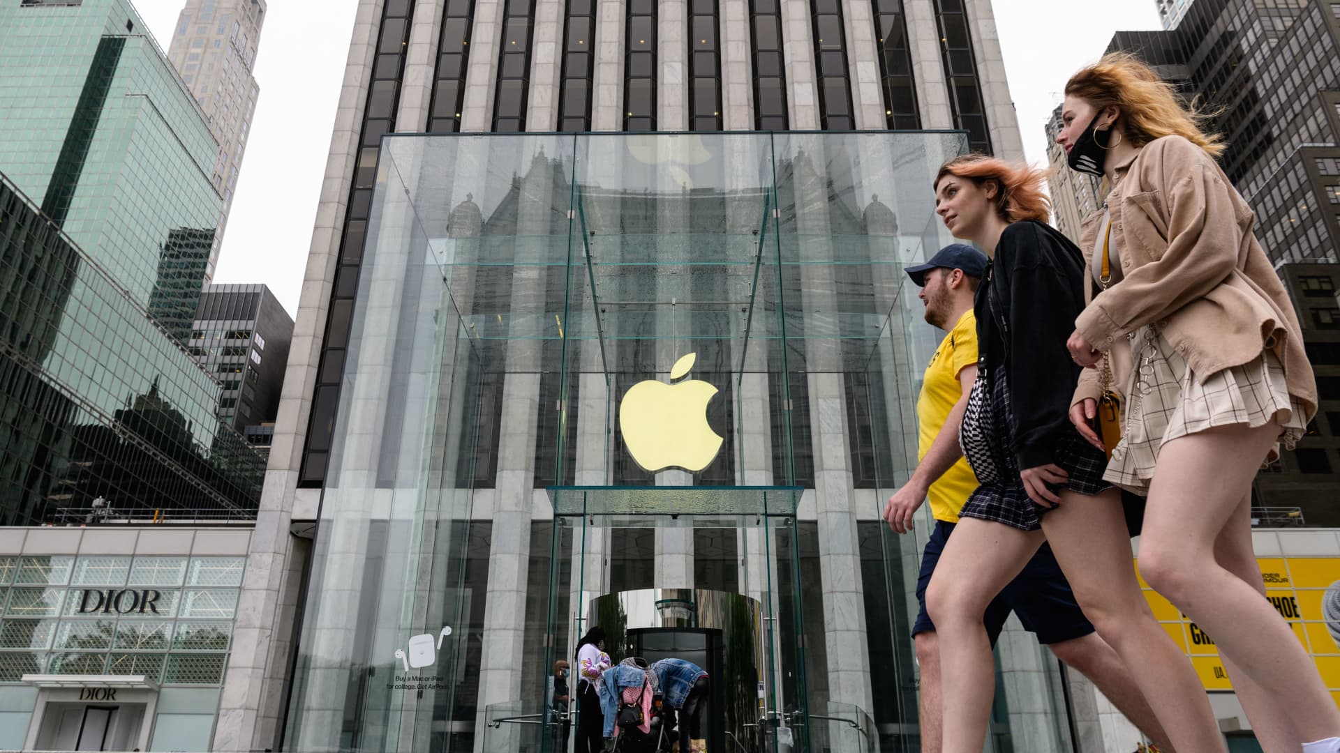 People walk past an Apple retail store on July 13, 2021 in New York City.
