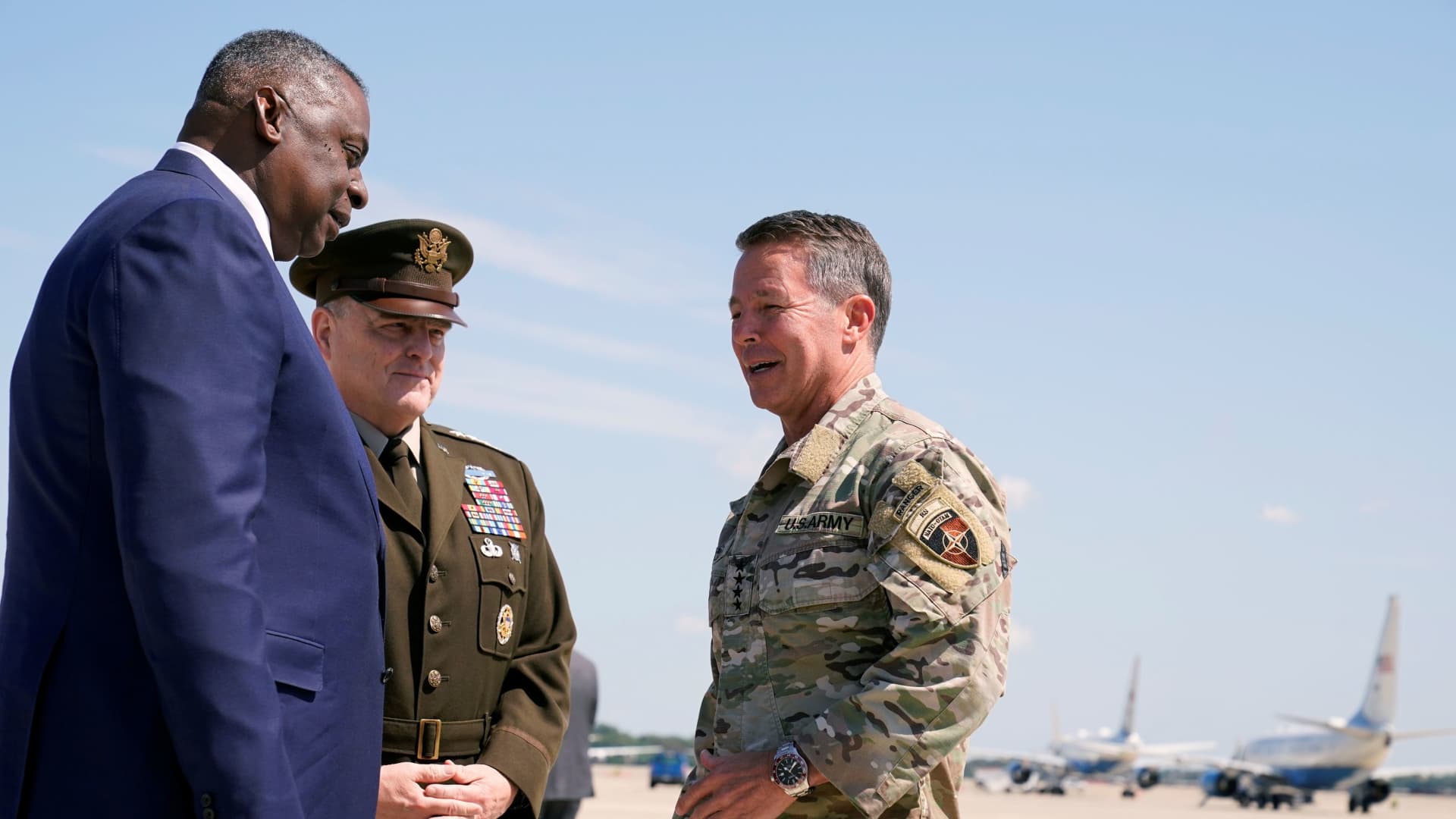 U.S. Secretary of Defense Lloyd Austin, left, and Joint Chiefs of Staff General Mark Milley greet General Austin S. Miller, the former top U.S. commander in Afghanistan, upon his return, at Andrews Air Force Base, U.S. July 14, 2021.