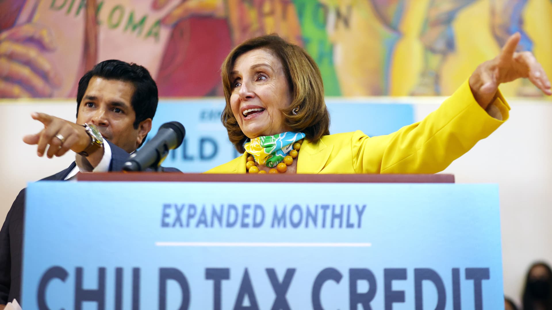 House Speaker Nancy Pelosi, D-Calif., and Rep. Jimmy Gomez, D-Calif., at a press conference about the child tax credit at the Barrio Action Youth and Family Center in Los Angeles on July 15, 2021.