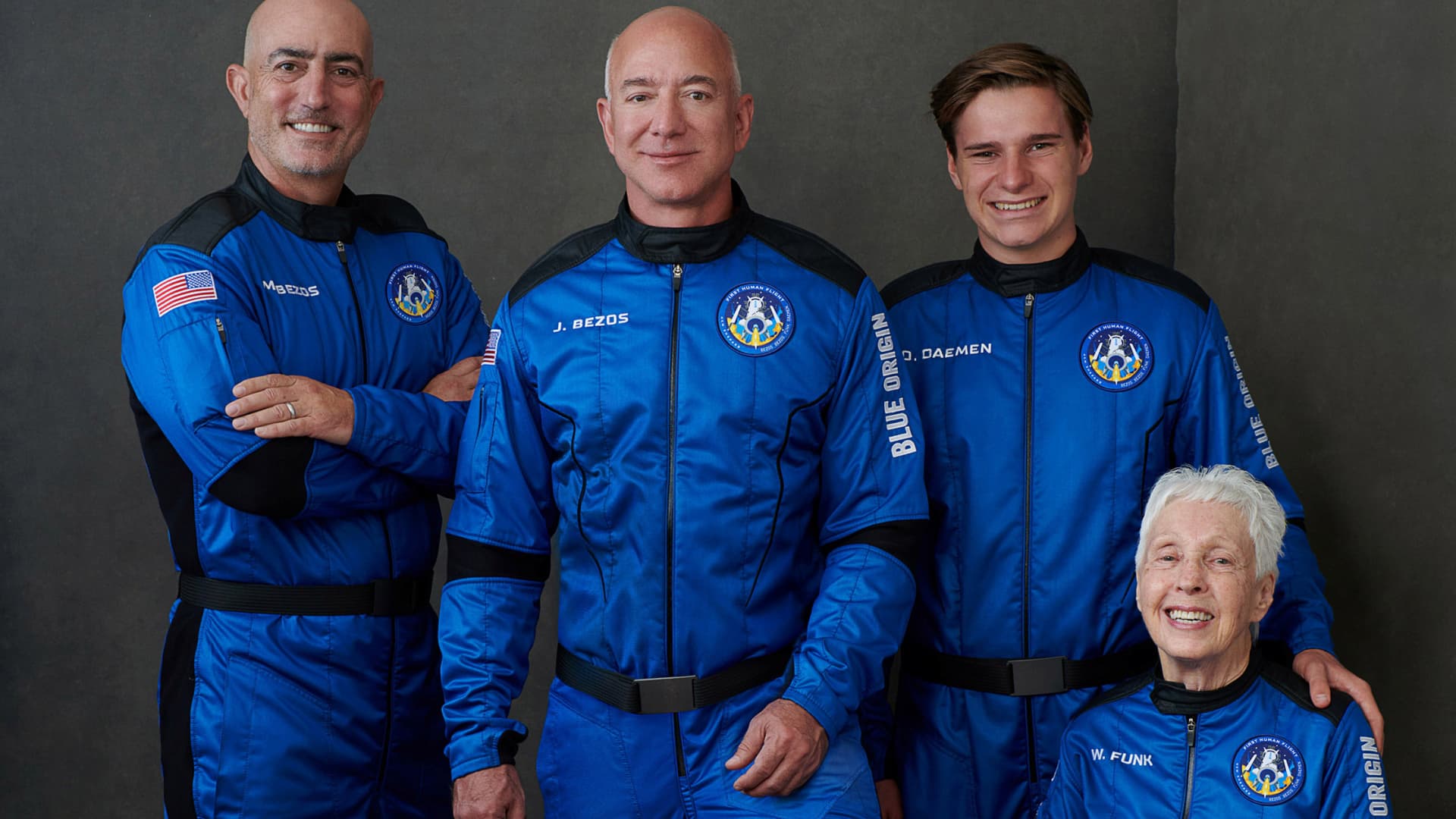 Billionaire Jeff Bezos, founder of ecommerce company Amazon.com Inc, his brother Mark Bezos, a private equity executive, pioneering female aviator Wally Funk and recent Dutch high school graduate Oliver Daemen pose in an undated photograph, ahead of their scheduled flight aboard Blue Origin's New Shepard rocket near Van Horn, Texas, U.S.