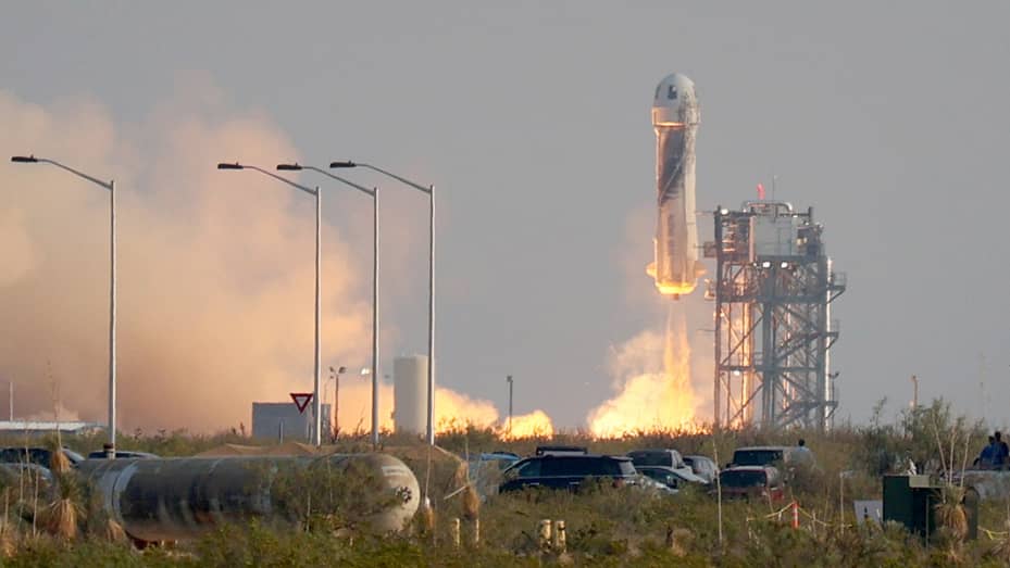 The New Shepard Blue Origin rocket lifts-off from the launch pad carrying Jeff Bezos along with his brother Mark Bezos, 18-year-old Oliver Daemen, and 82-year-old Wally Funk prepare to launch on July 20, 2021 in Van Horn, Texas.