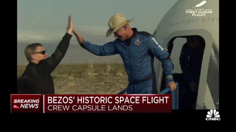 Amazon founder Jeff Bezos returns to Earth after successful Blue Origin space launch