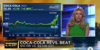Coca-Cola earnings beat estimates, raises forecast