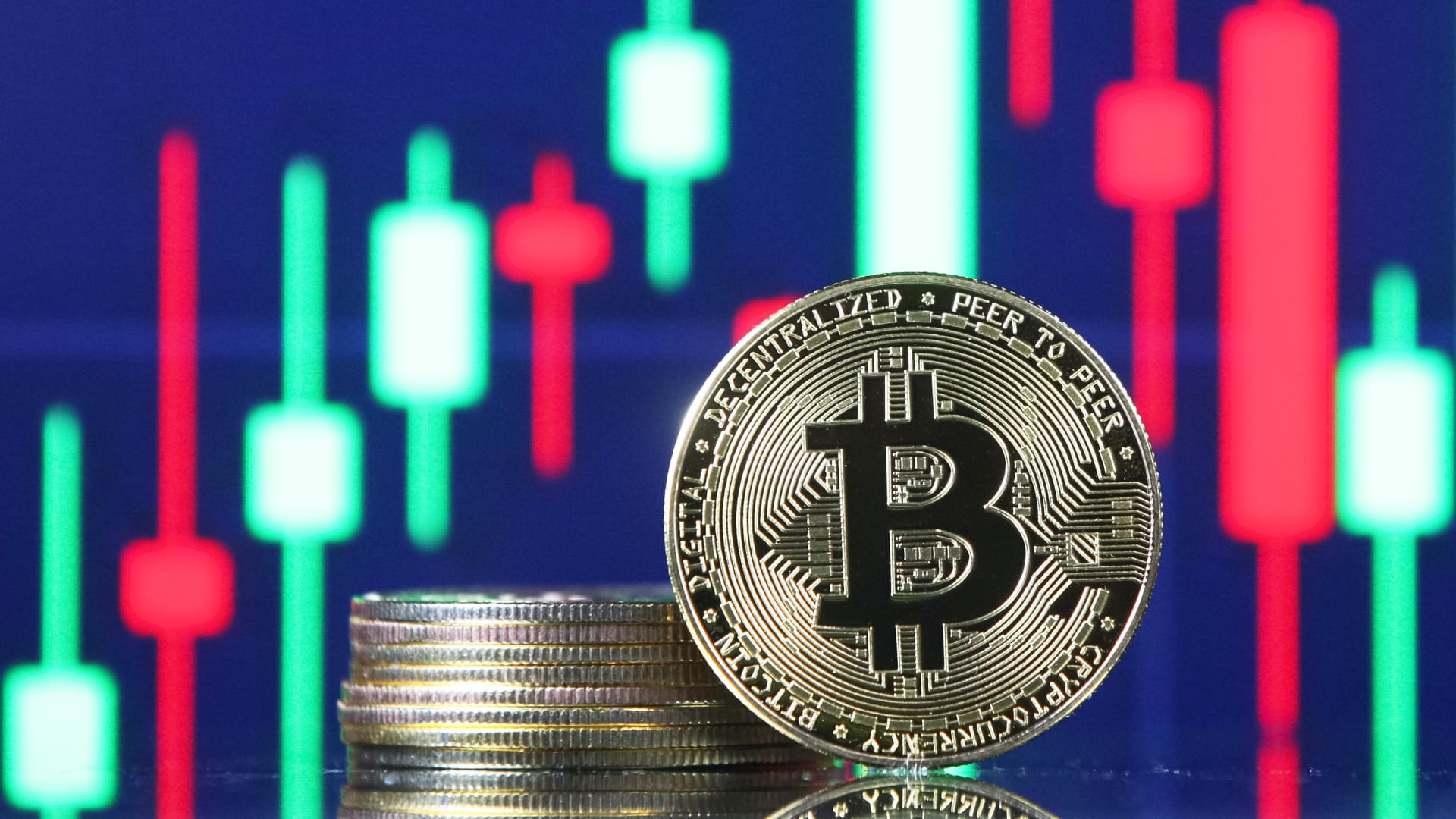 Bitcoin and ether fall as investors weigh persistent inflation and