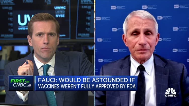 We can vaccinate the world and administer booster shot to Americans, Fauci says