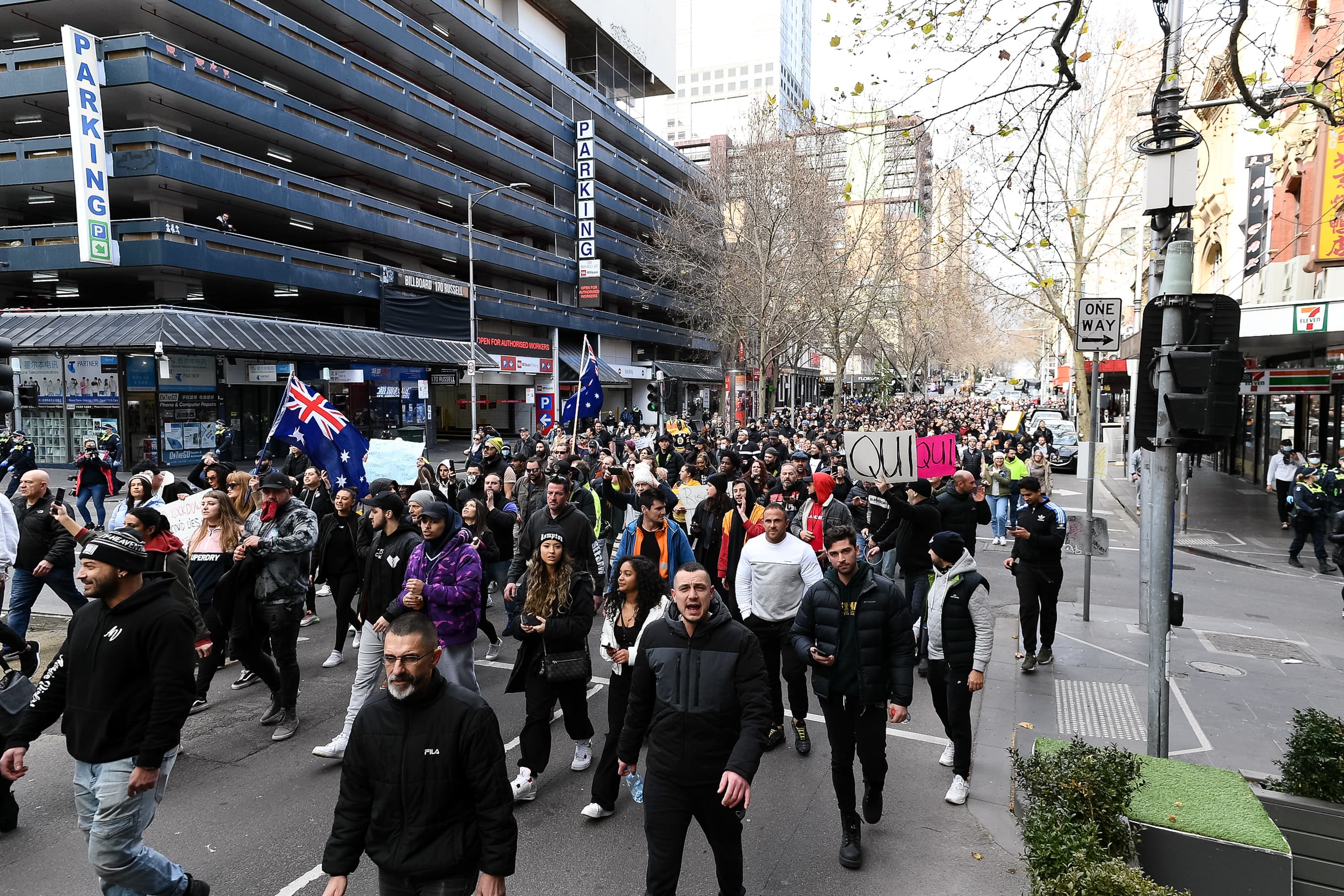 Police clash with protesters as Australia reports record Covid cases