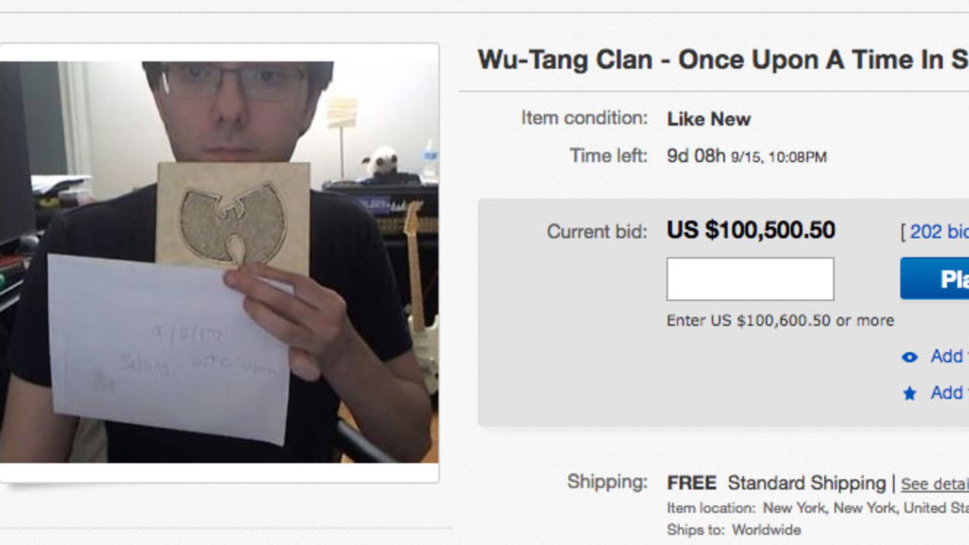 Martin Shkreli holds up a rare Wu-Tang Clan album for sale. 