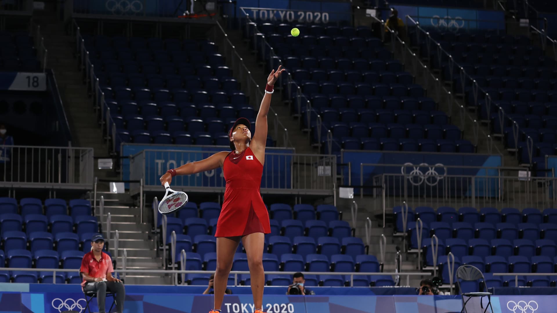 Naomi Osaka of Team Japan serves during her Women's Singles Third Round match against Marketa Vondrousova of Team Czech Republic on day four of the Tokyo 2020 Olympic Games at Ariake Tennis Park on July 27, 2021 in Tokyo, Japan.
