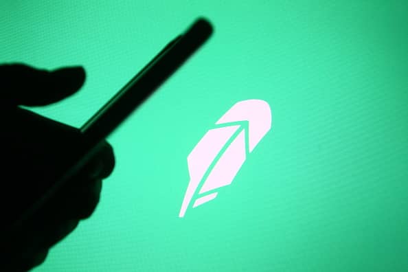 Robinhood valued at  billion after selling shares in IPO at  per share, source says