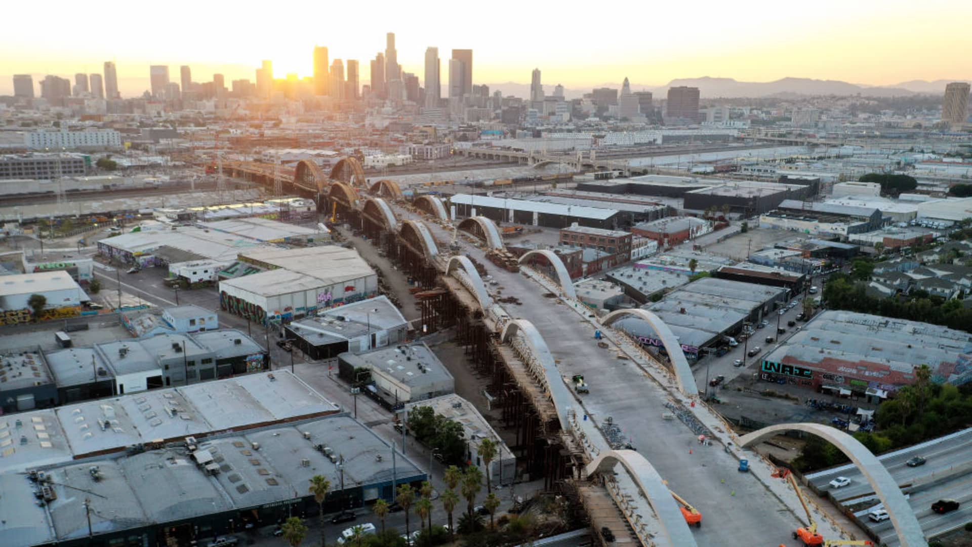 An aerial view shows construction continuing on the Sixth Street Viaduct replacement project, connecting Boyle Heights with downtown, on July 28, 2021 in Los Angeles, California.