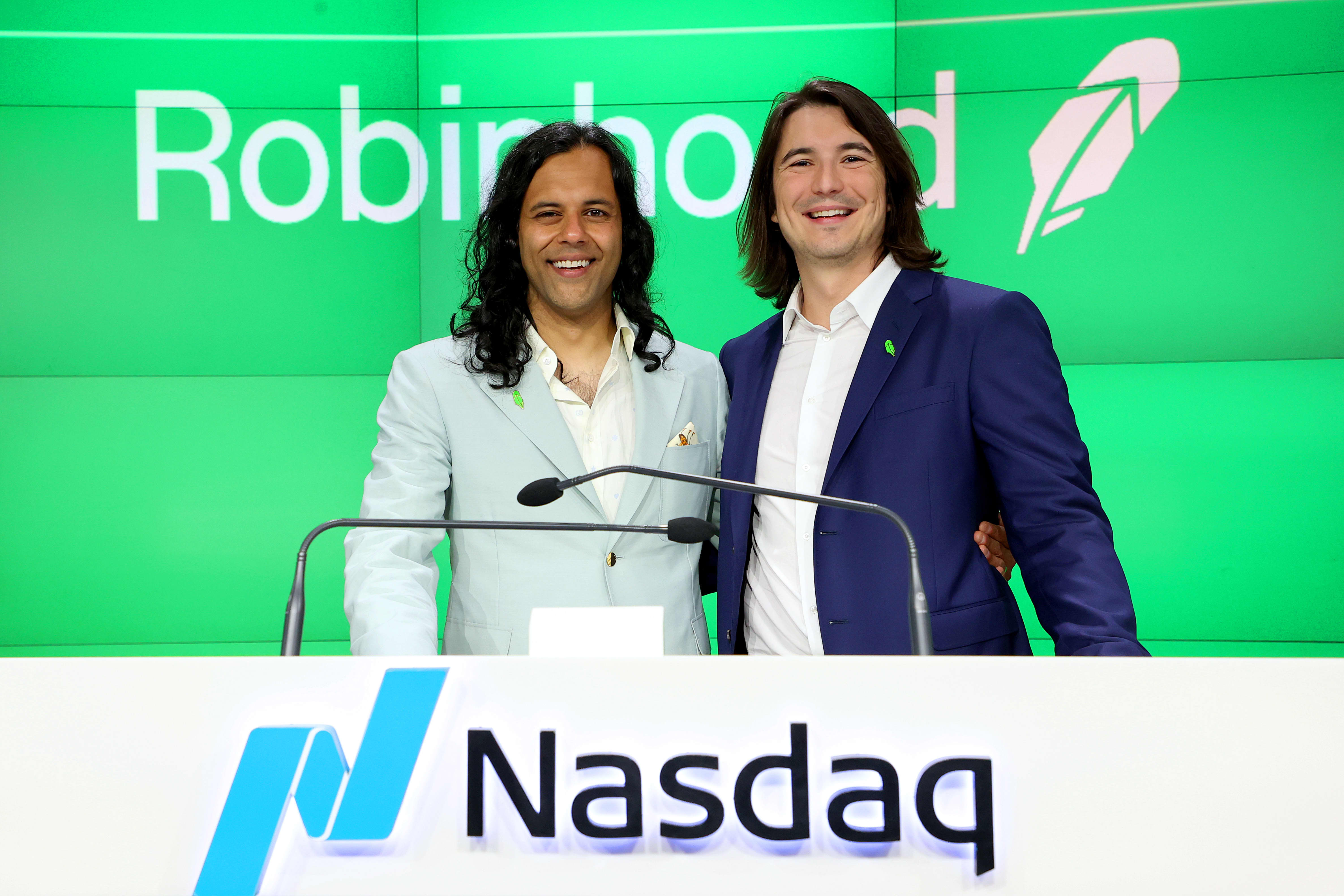 Robinhood shares turn positive after falling as much as 14%