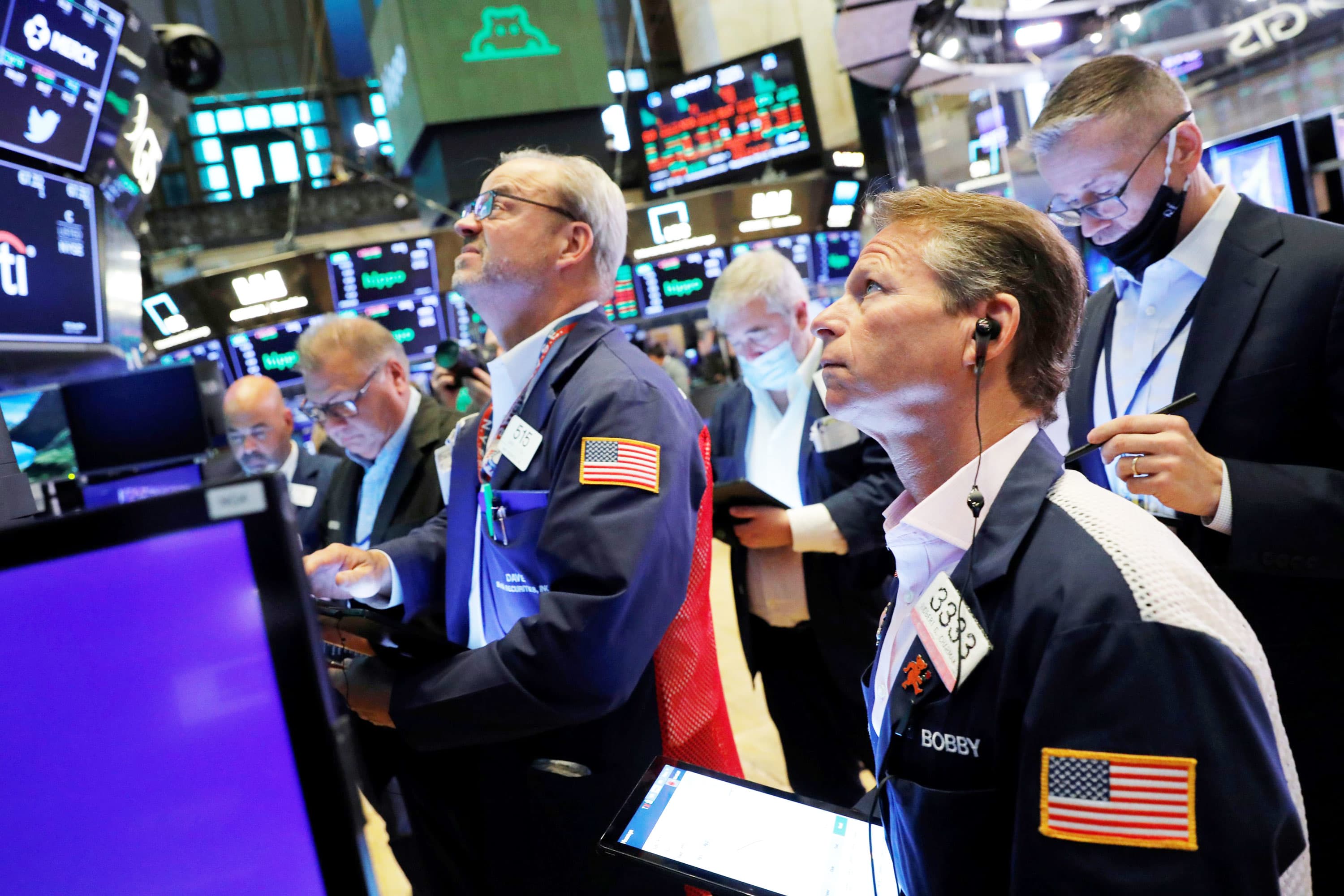 Dow rises more than 100 points to fresh record