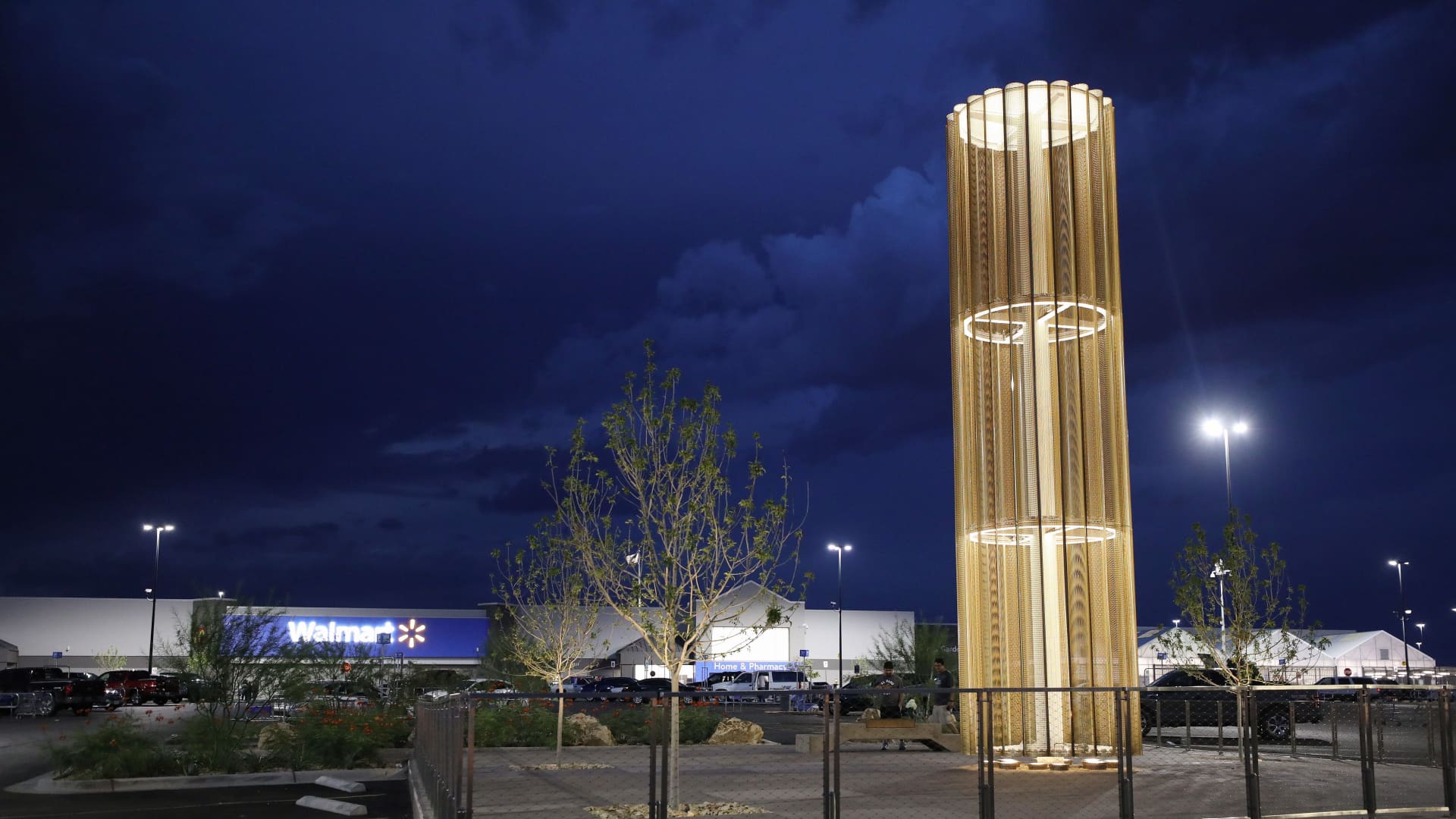 The ‘Grand Candela’ memorial honoring victims shines at dusk in the parking lot of a Walmart in El Paso, Texas.