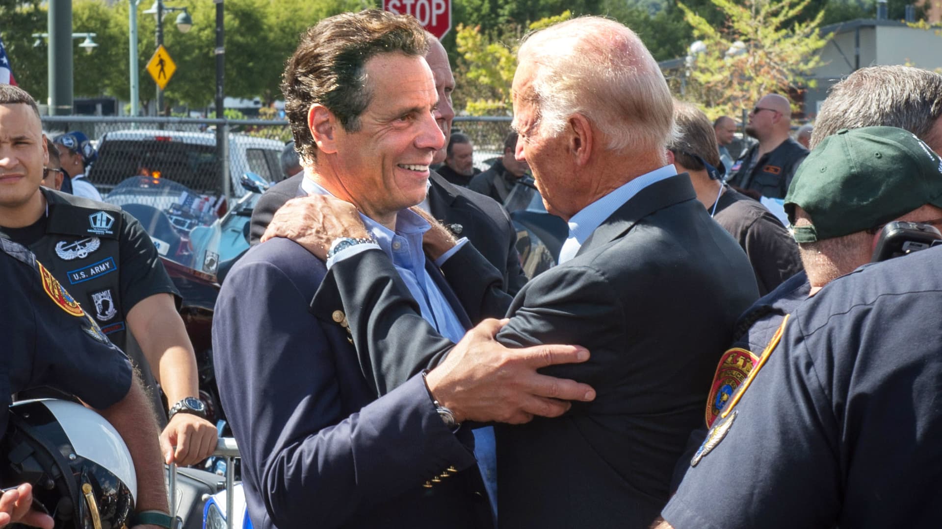 New York Gov. Andrew Cuomo and Vice President Joseph Biden embrace following a luncheon honoring motorcycle riders participating in the 9/11 Memorial Motorcycle Ride, Friday, Sept. 11, 2015, in New York.