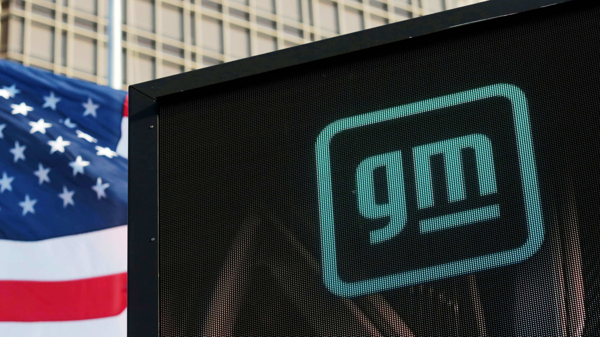 The GM logo is seen on the facade of the General Motors headquarters in Detroit, Michigan, March 16, 2021.