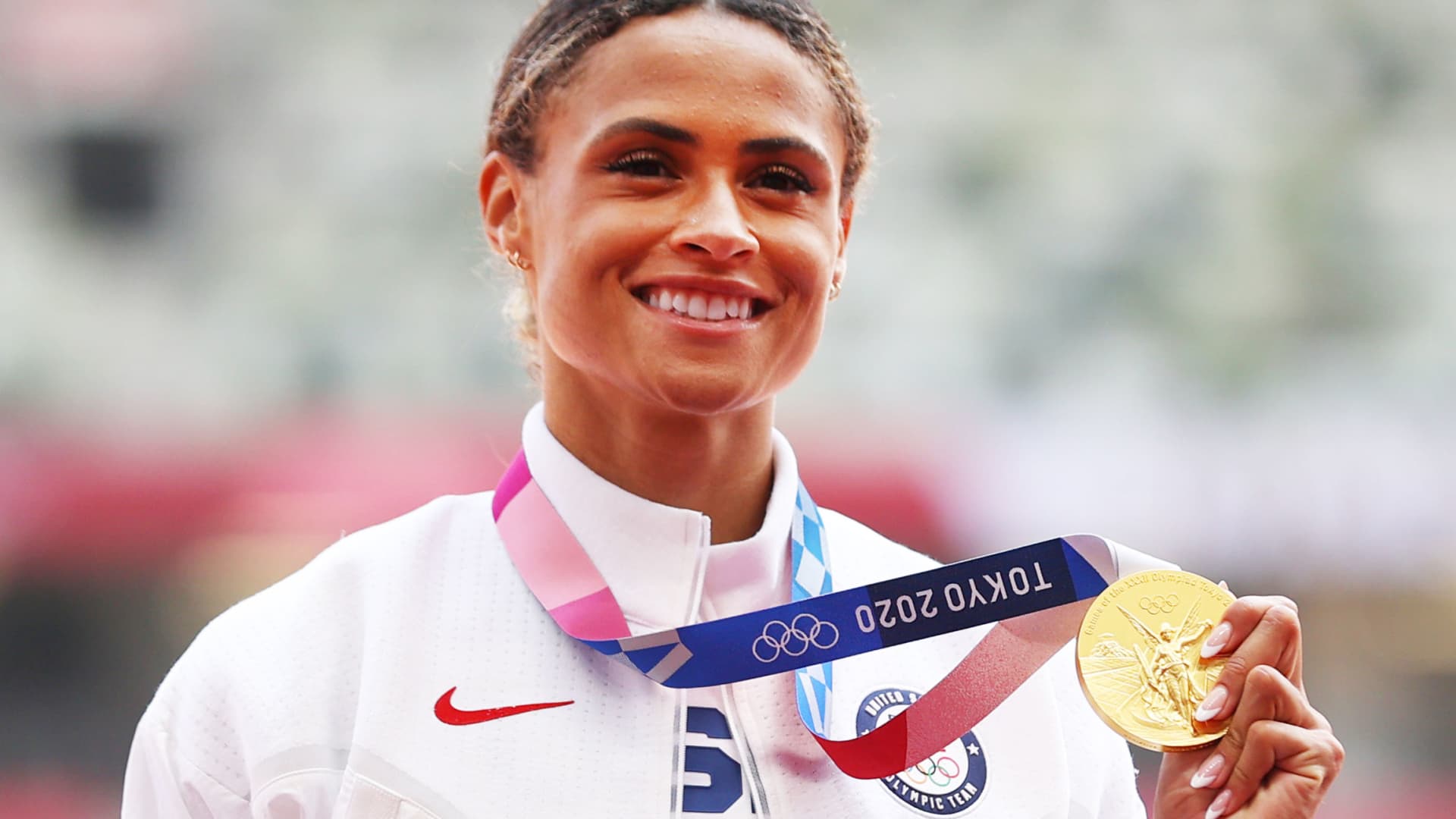 Sydney McLaughlin of the United States poses with her gold medal for the Women's 400m hurdles, Olympic Stadium, Tokyo, Japan, August 4, 2021.