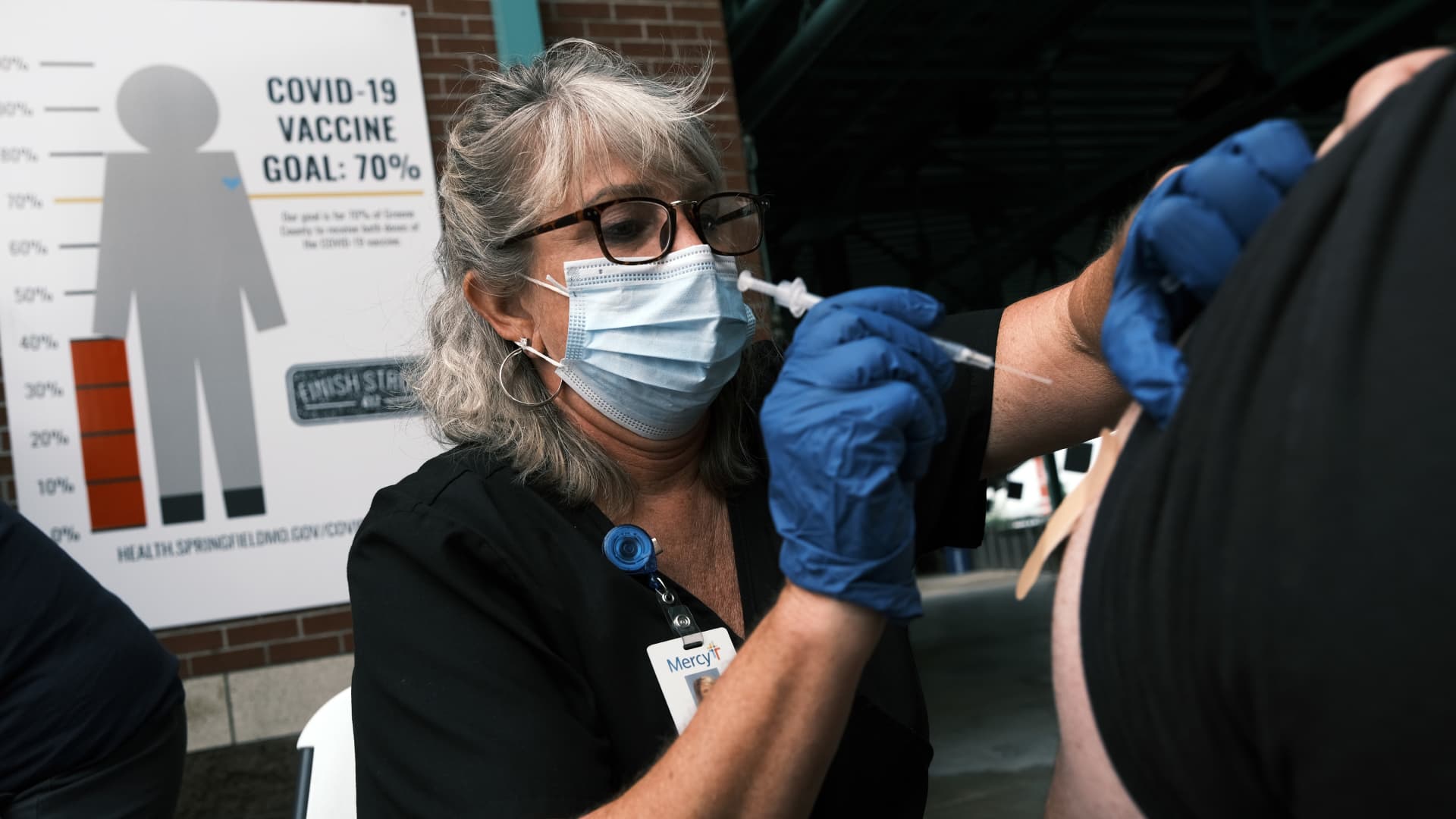 A nurse administers the Covid-19 vaccine at a baseball game on August 05, 2021 in Springfield, Missouri. According to the latest numbers from the state’s health department, little more than 4 in 10 Missourians have received the Covid-19 vaccine.