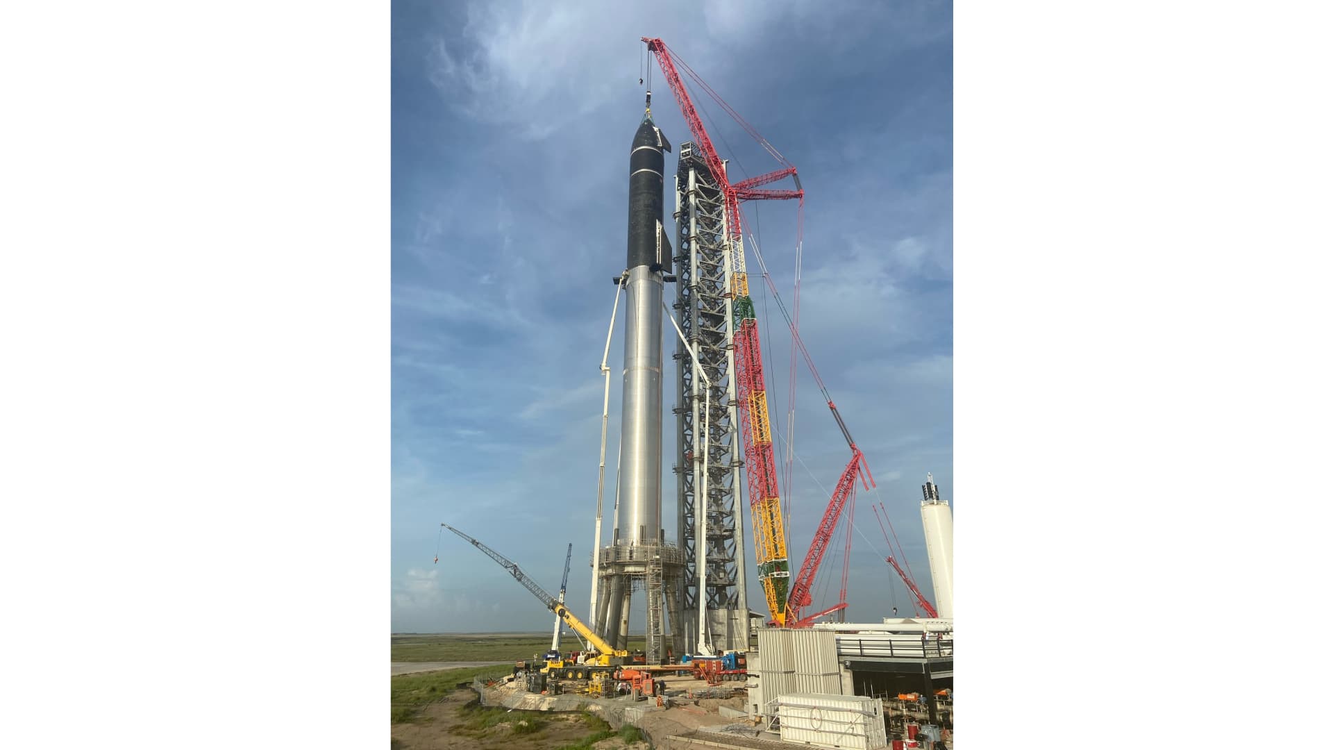 SpaceX stacks Starship prototype 20 on top of Super Heavy rocket Booster 4 on August 6, 2021.