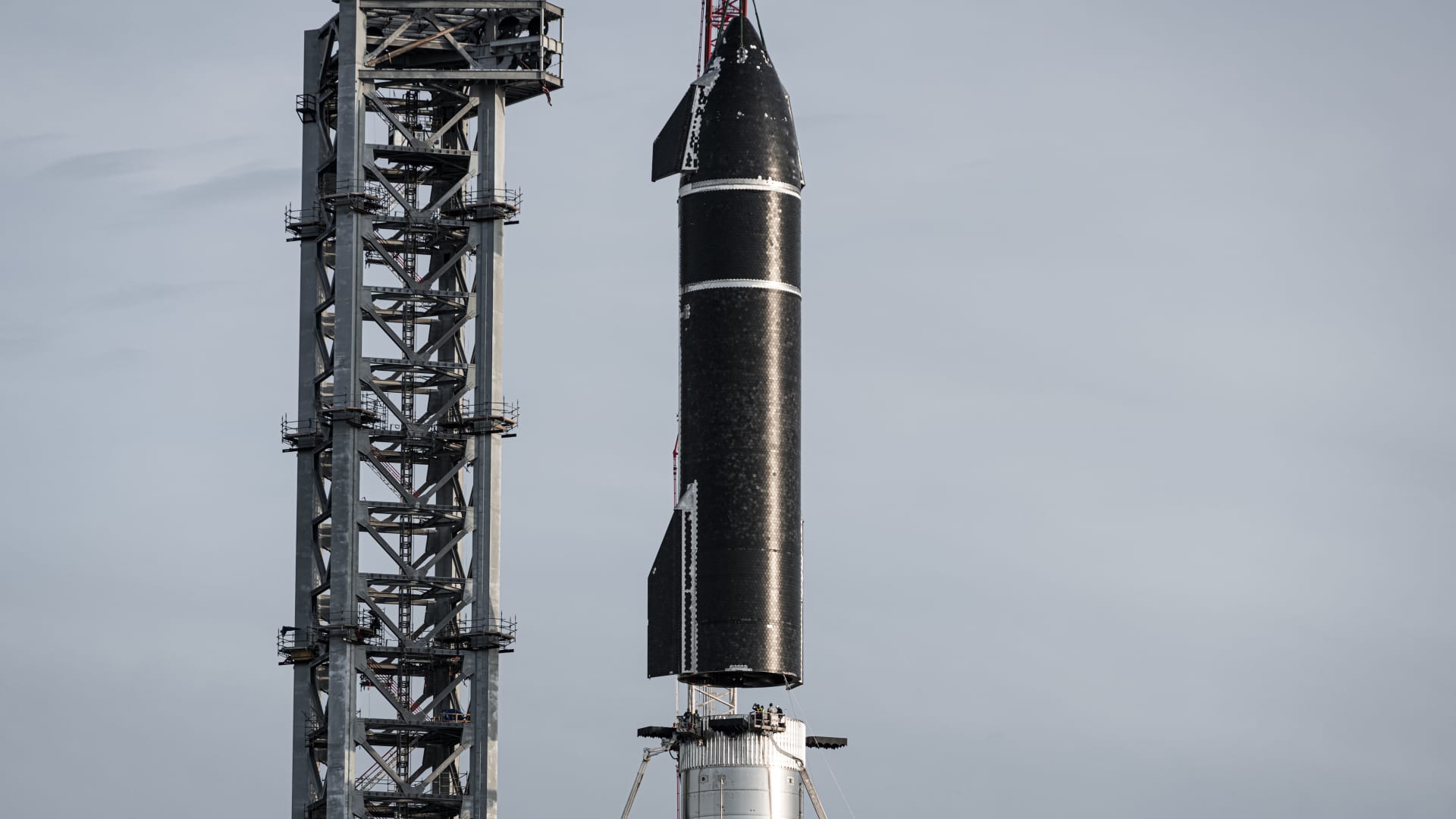 Starship prototype 20 is stacked on top of Super Heavy Booster 4 on August 6, 2021.