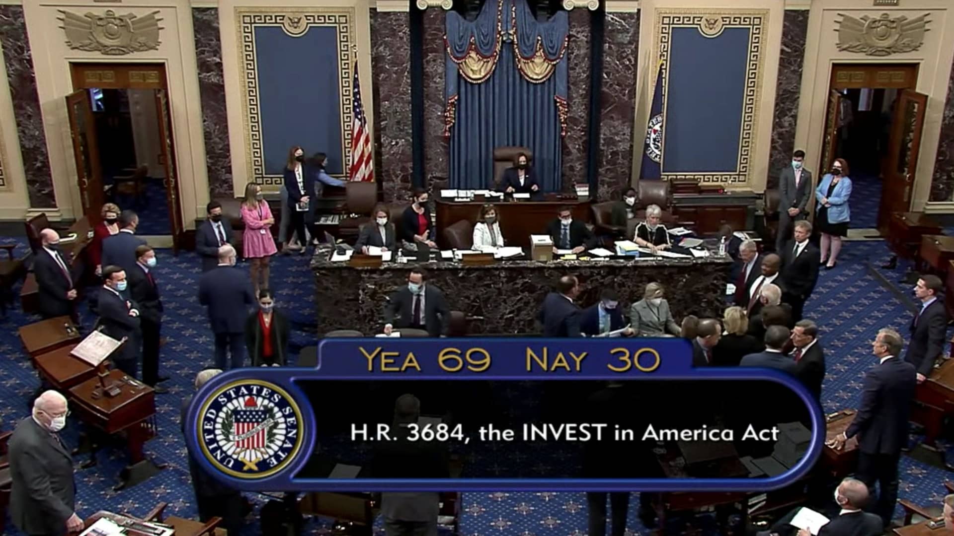 U.S. Vice President Kamala Harris presides over the U.S. Senate and announces the vote totals of 69 Yeas and 30 Nays as the Senate passes a $1 trillion bipartisan infrastructure bill, as seen in a frame grab from video shot in the U.S. Senate chamber on Capitol Hill in Washington, U.S., August 10, 2021.