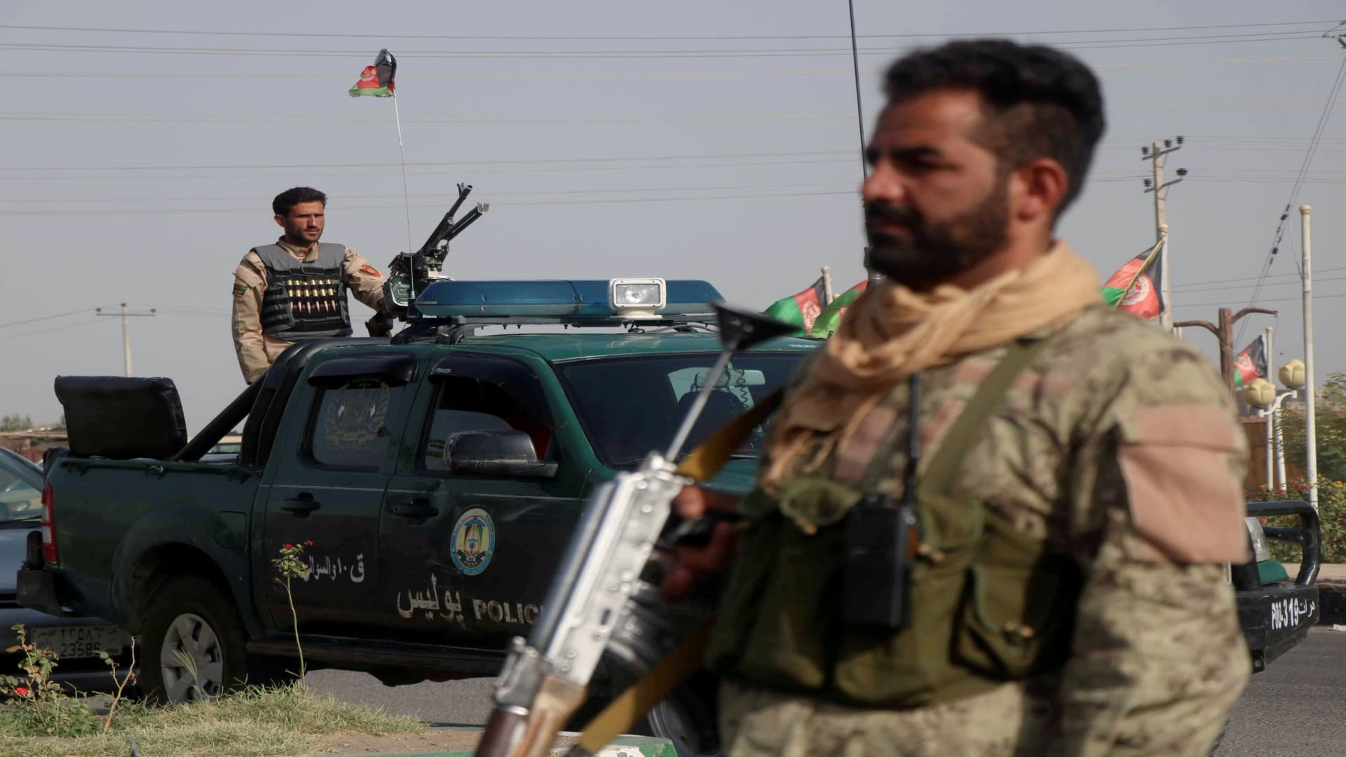 Afghan security forces keep watch at a checkpoint in the Guzara district of Herat province, Afghanistan July 9, 2021.