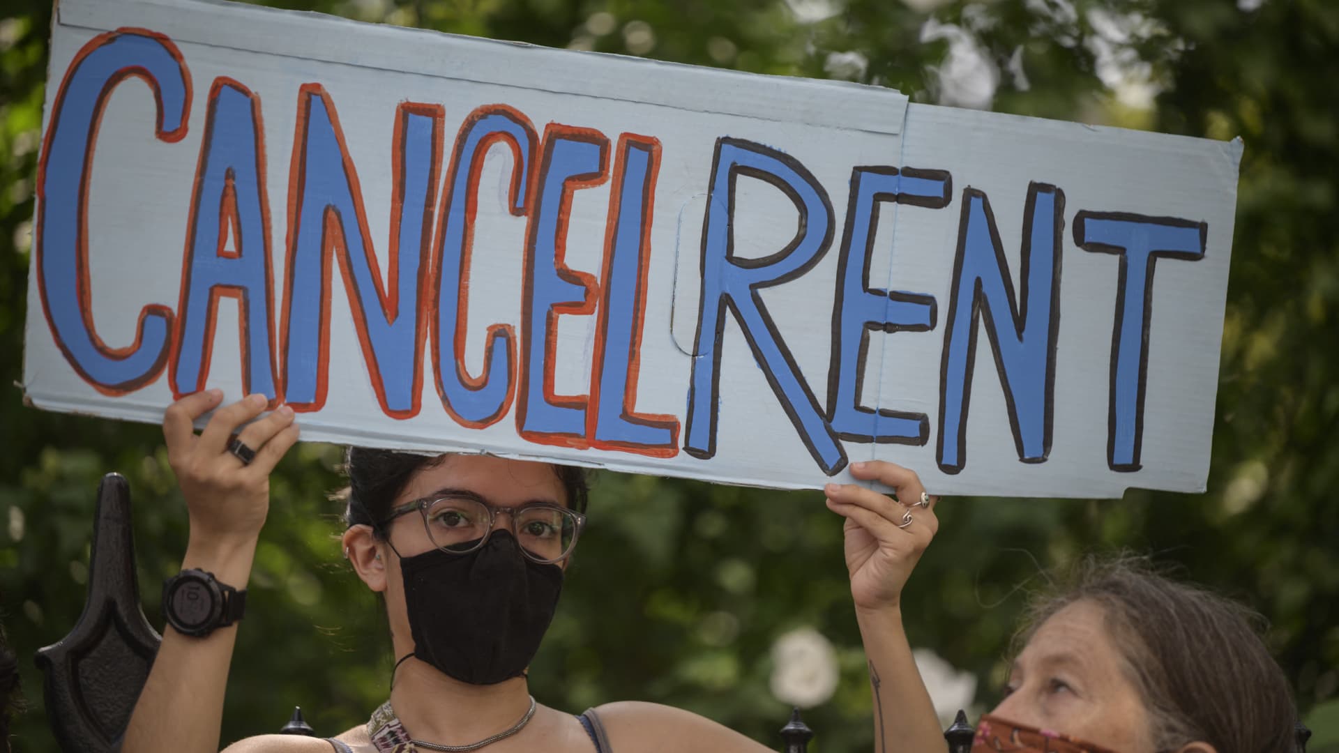 Demonstrators attend a rally calling for an extension of the state's eviction ban until 2022 and the cancellation of rent, in lower Manhattan, New York city on August 11, 2021.