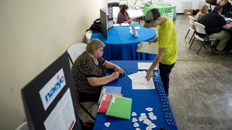 Weekly initial jobless claims down 12,000 to 375,000