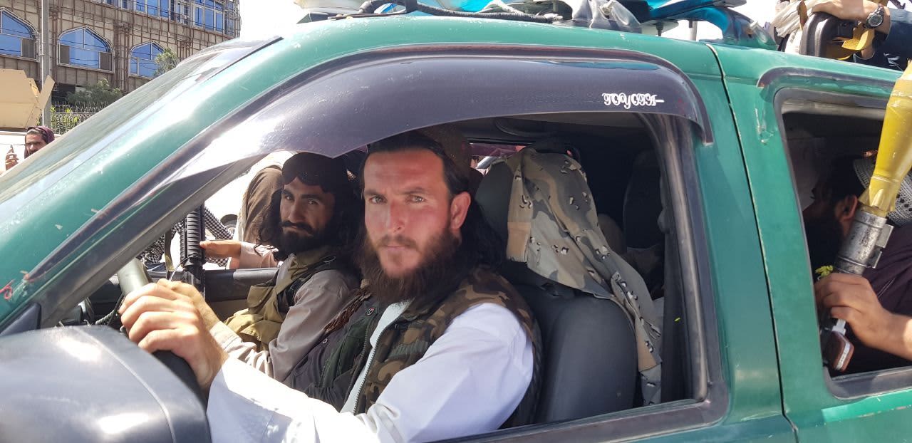 Photos show turmoil and panic as Taliban enter Afghanistan's capital Kabul