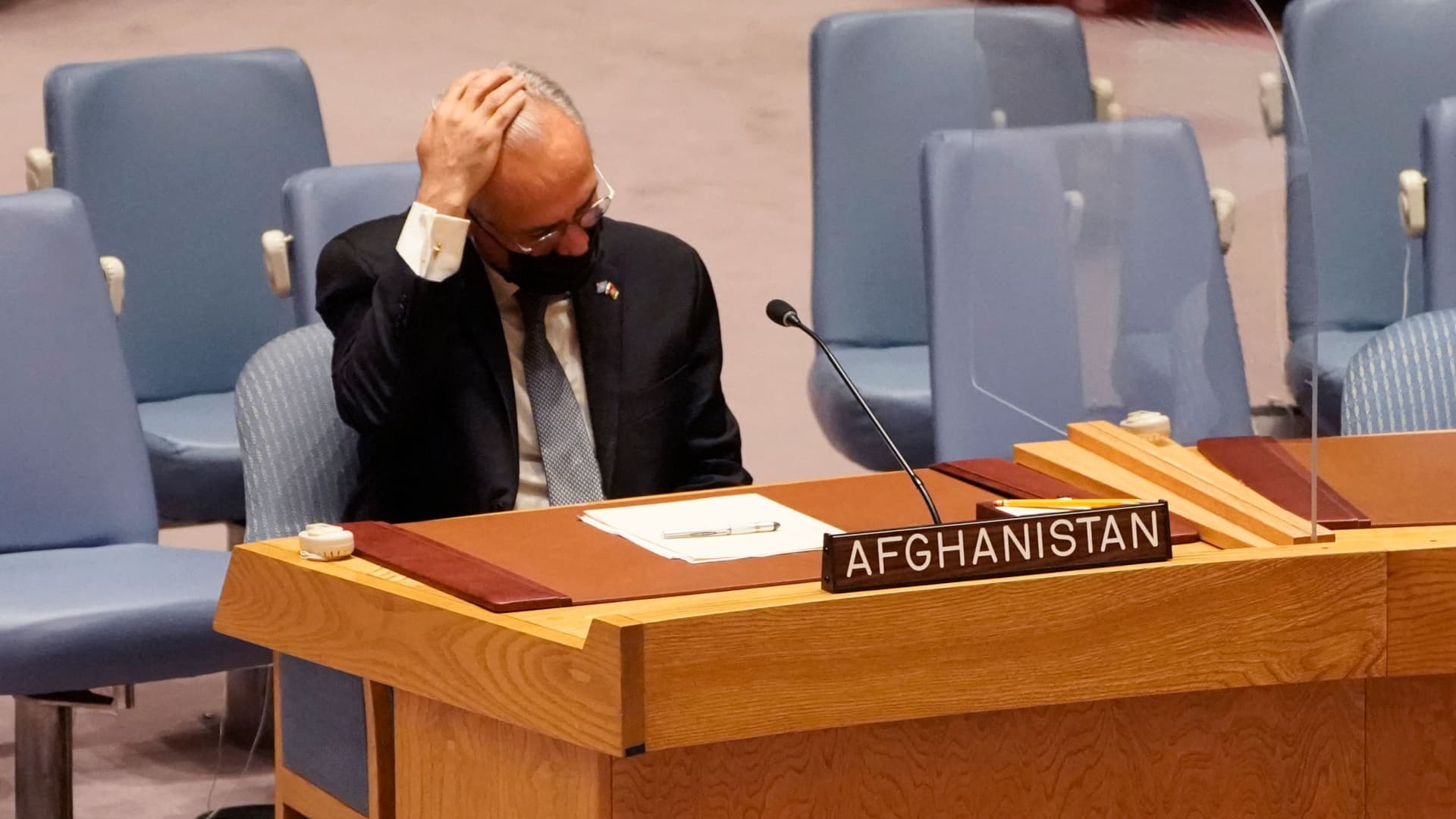 Permanent Representative of Afghanistan to the United Nations, Ghulam M. Isaczai waits to speak during a UN security council meeting on Afghanistan on August 16, 2021 at the United Nations in New York.