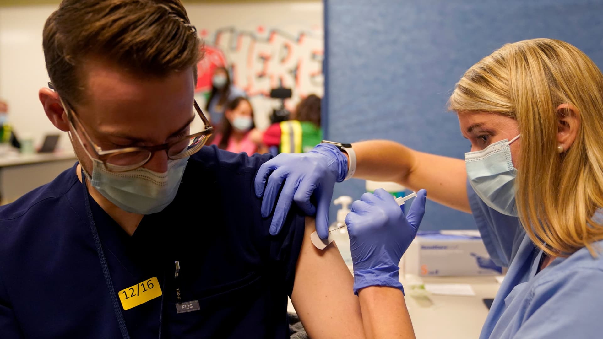 Fourth-year medical student Anna Roesler administers the Pfizer-BioNTech coronavirus disease (COVID-19) vaccine at Indiana University Health, Methodist Hospital in Indianapolis, Indiana, December 16, 2020.