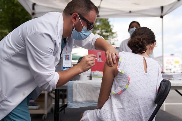 U.S. should focus on vaccinating the rest of the world before Covid booster shots, says Dr. Vin Gupta