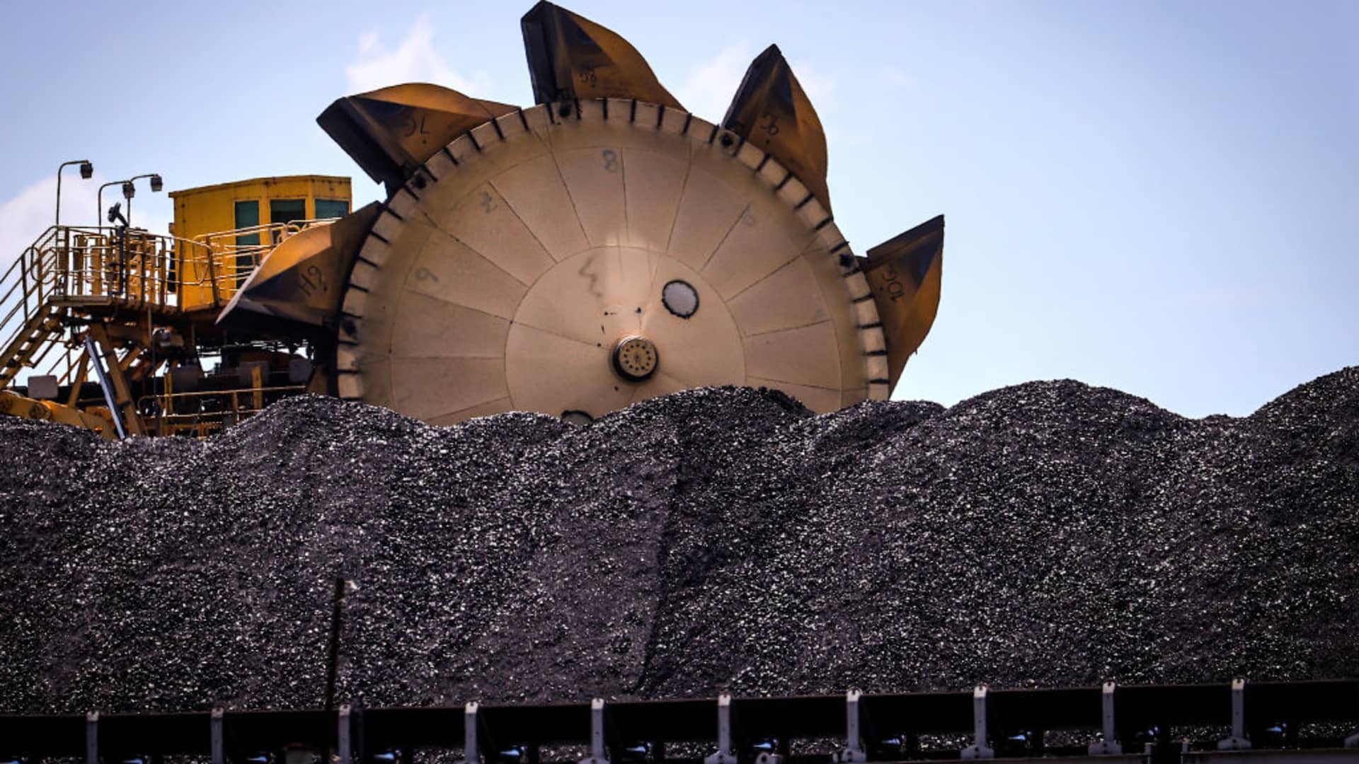 A bucket-wheel reclaimer stands next to a pile of coal at the Port of Newcastle in Newcastle, New South Wales, Australia, on Monday, Oct. 12, 2020.