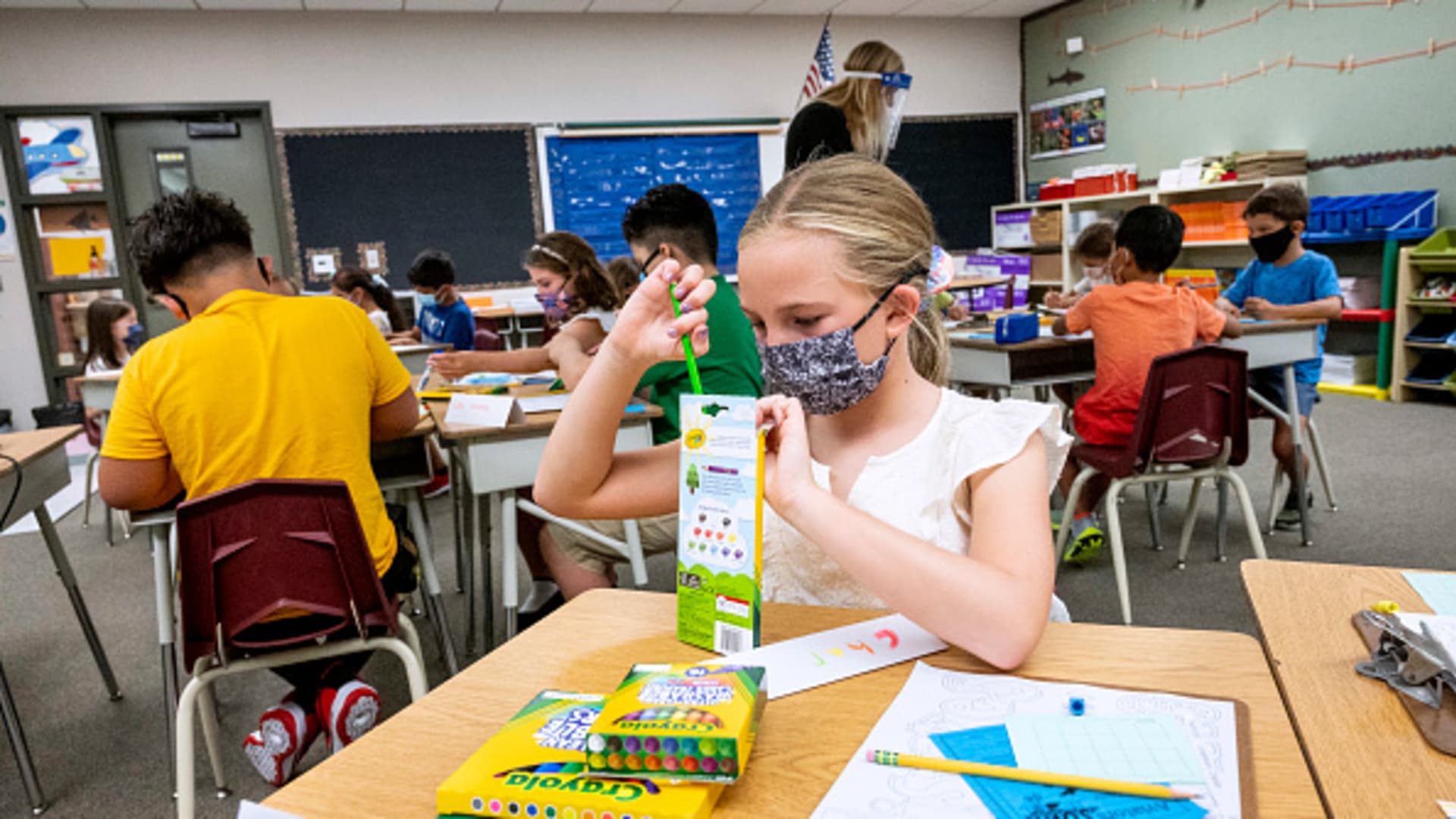 A student works on her name tag in a second and third grade combo class during the first day of school at Laguna Niguel Elementary School in Laguna Niguel, CA on Tuesday, August 17, 2021.