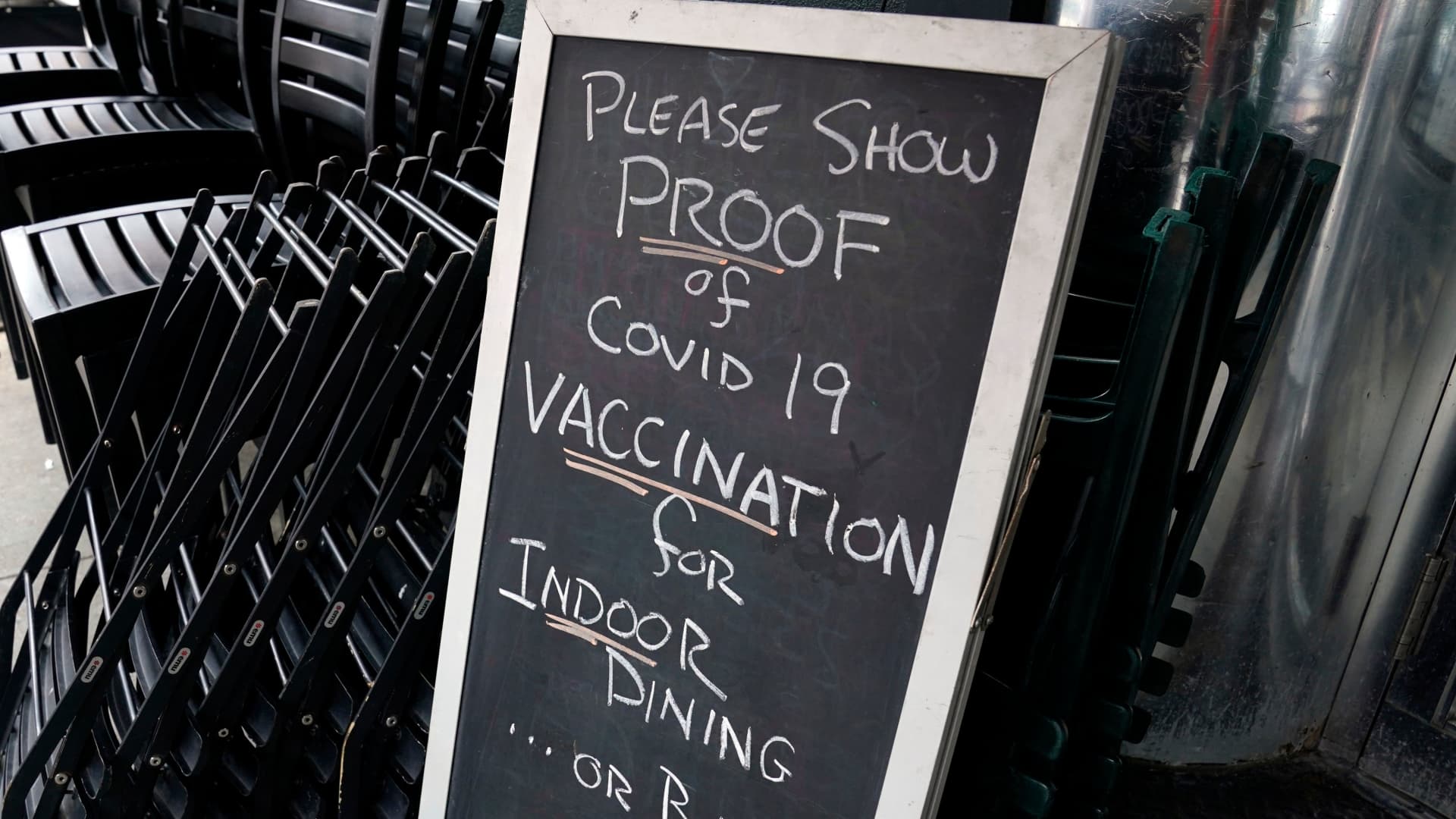 A sign is viewed at a restaurant in New York's Upper West Side on August 17, 2021, the first day where you have to show proof of having a Covid-19 vaccination to participate in indoor dining.