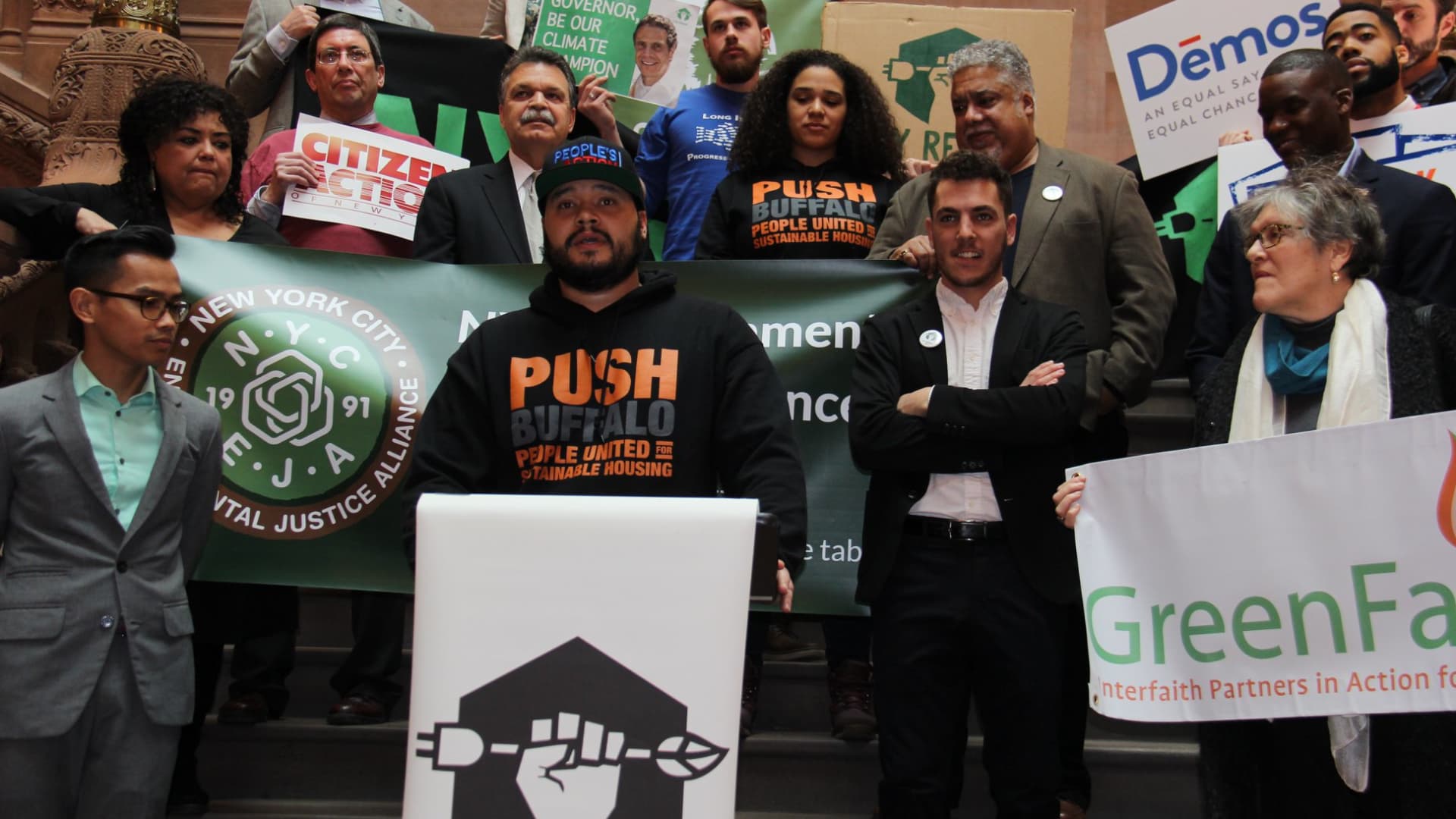Daniel Sherrell (front row arms crossed) at a press conference with the NY Renews coalition, advocating for the passage of a climate bill, the Climate Leadership and Community Protection Act of 2019.