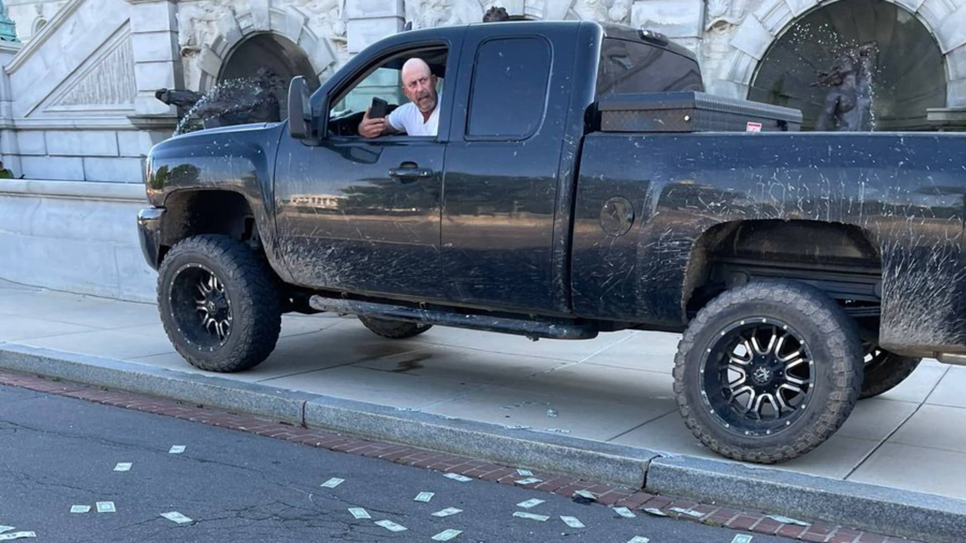 Floyd Ray Roseberry sits in his pickup truck in a standoff with Capitol Police outside the Library of Congress in Washington D.C. on Aug. 19th, 2021