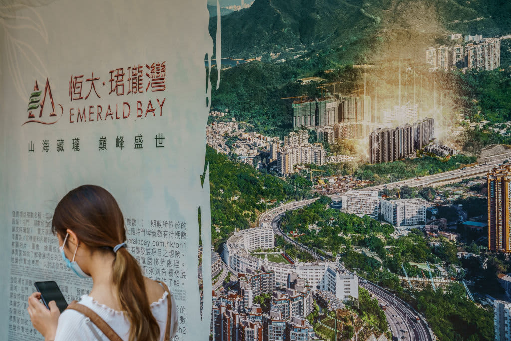China Evergrande says property sales drop, warns it could default