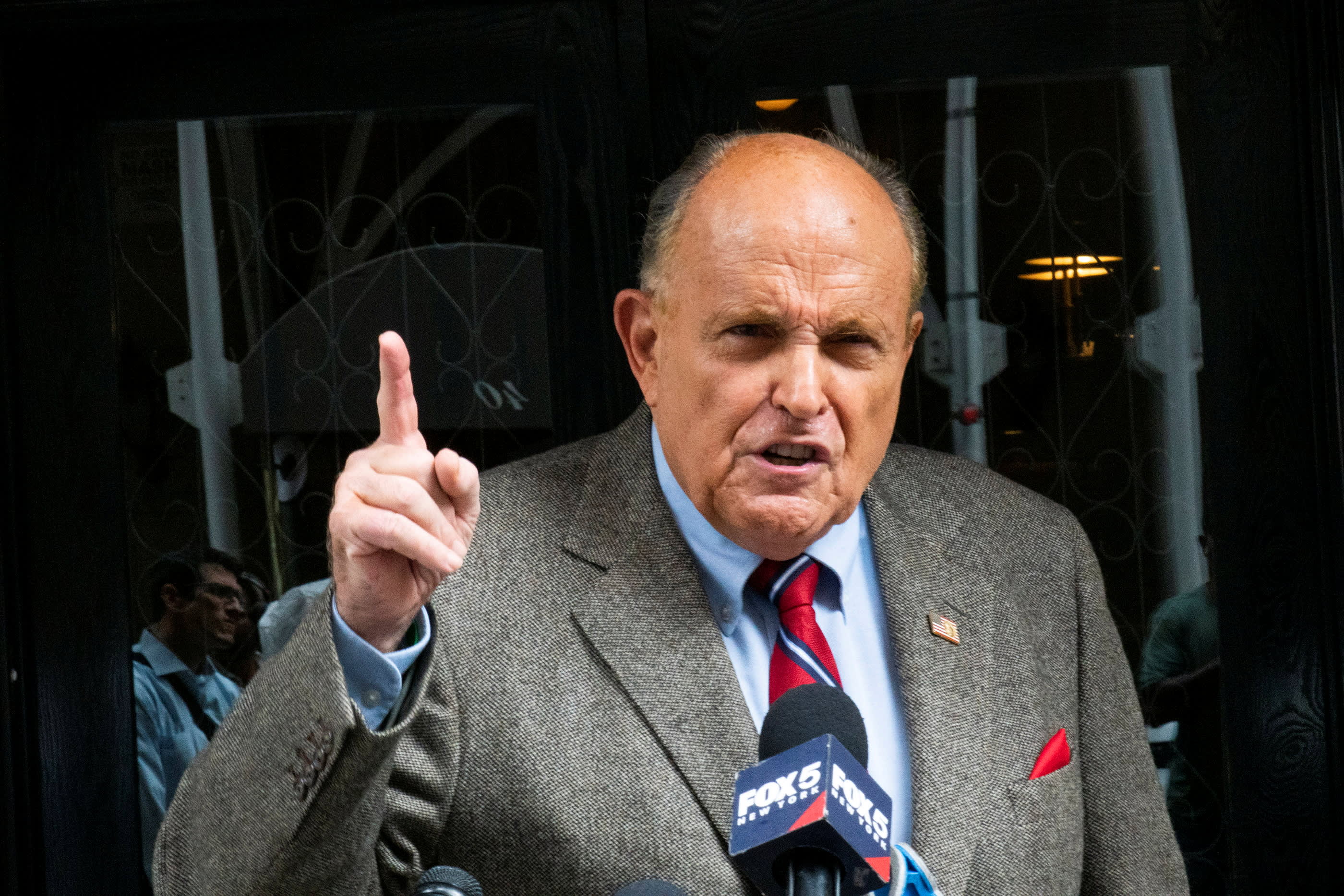 Trump lawyer Rudy Giuliani and other aides asked GOP prosecutor to give them Michigan county voting machines after 2020 election report says – CNBC