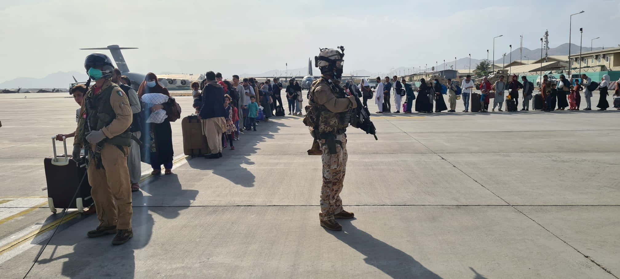 Deadly firefight erupts at Kabul airport as evacuation chaos continues